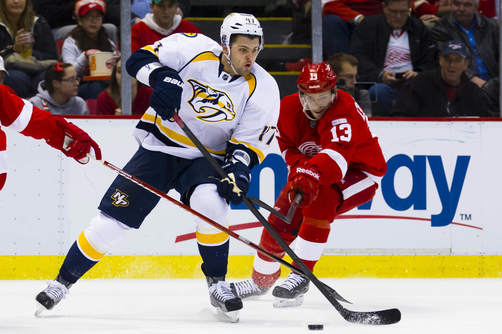 Nashville Predators right wing Alexander Radulov (47) is defended by Detroit Red Wings center Pavel Datsyuk (13) in the first period at Joe Louis Arena.