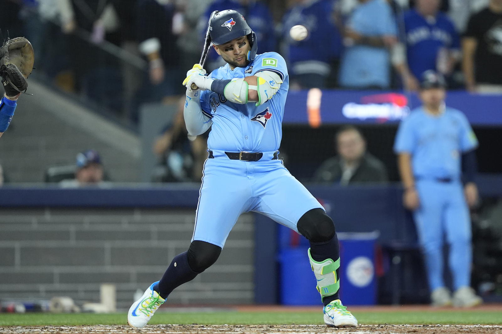 Toronto Blue Jays designated hitter Bo Bichette (11) avoids a pitch against the Los Angeles Dodgers in the sixth inning during game six of the 2025 MLB World Series at Rogers Centre. John E. Sokolowski-Imagn Images