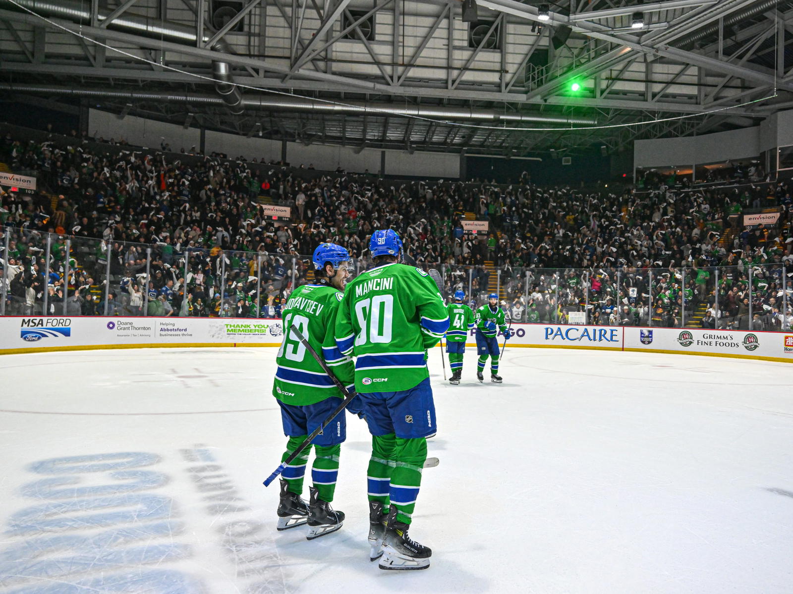 Victor Mancini and Kirill Kudryavtsev of the Abbotsford Canucks (Photo Credit: @abbycanucks on "X")