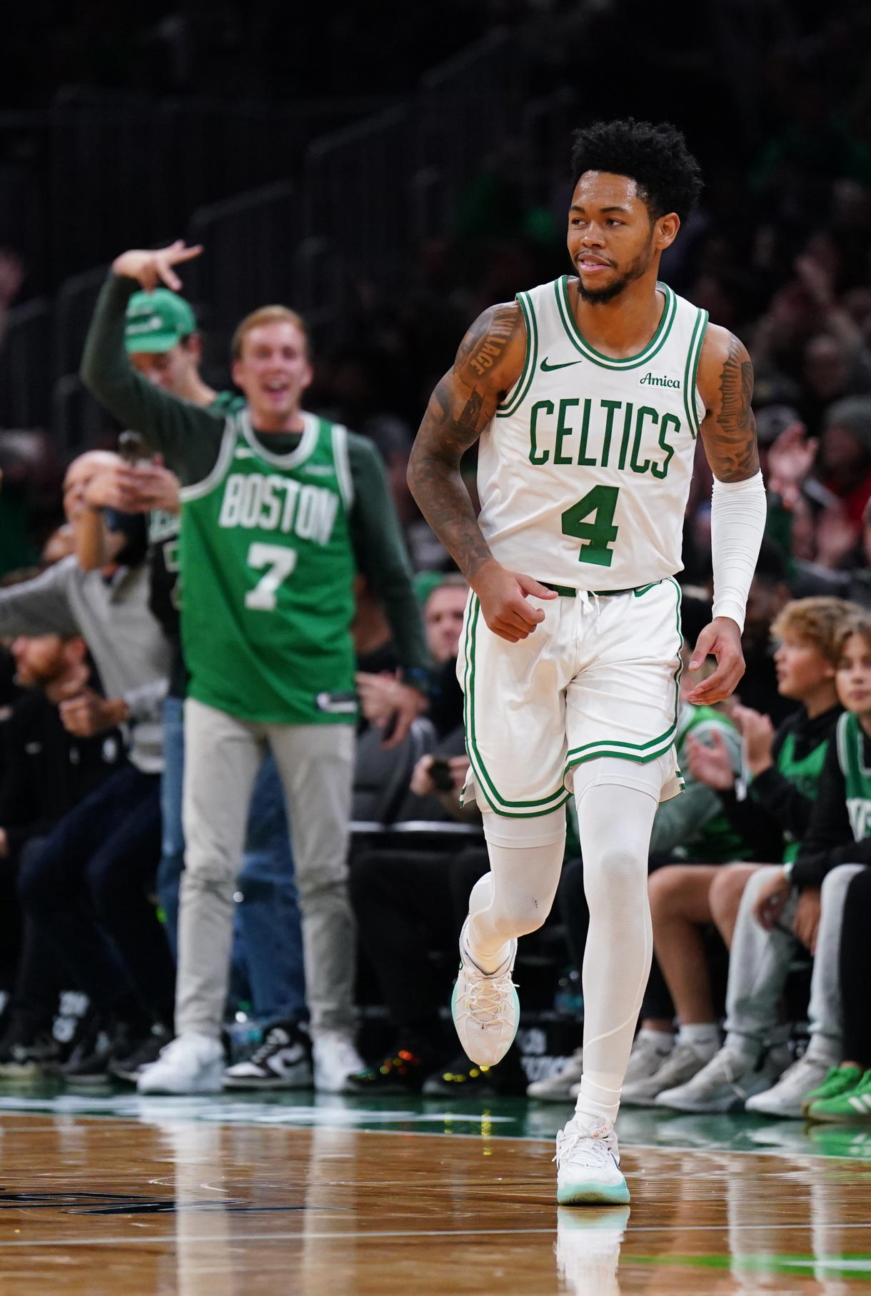 Oct 29, 2025; Boston, Massachusetts, USA; Boston Celtics guard Anfernee Simons (4) reacts after his three point basket against the Cleveland Cavaliers in the second half at TD Garden. (David Butler II/Imagn Images)