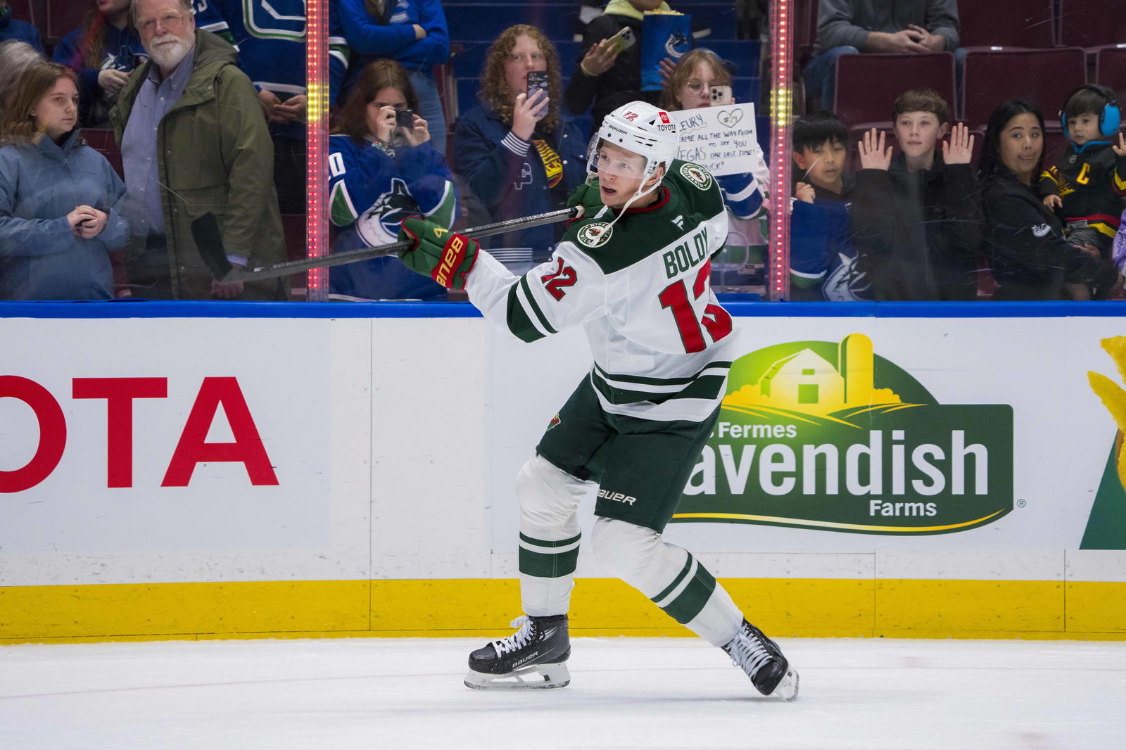 Mar 7, 2025; Vancouver, British Columbia, CAN; Minnesota Wild forward Matt Boldy (12) shoots during warm up prior to a game against the Vancouver Canucks at Rogers Arena. Mandatory Credit: Bob Frid-Imagn Images.