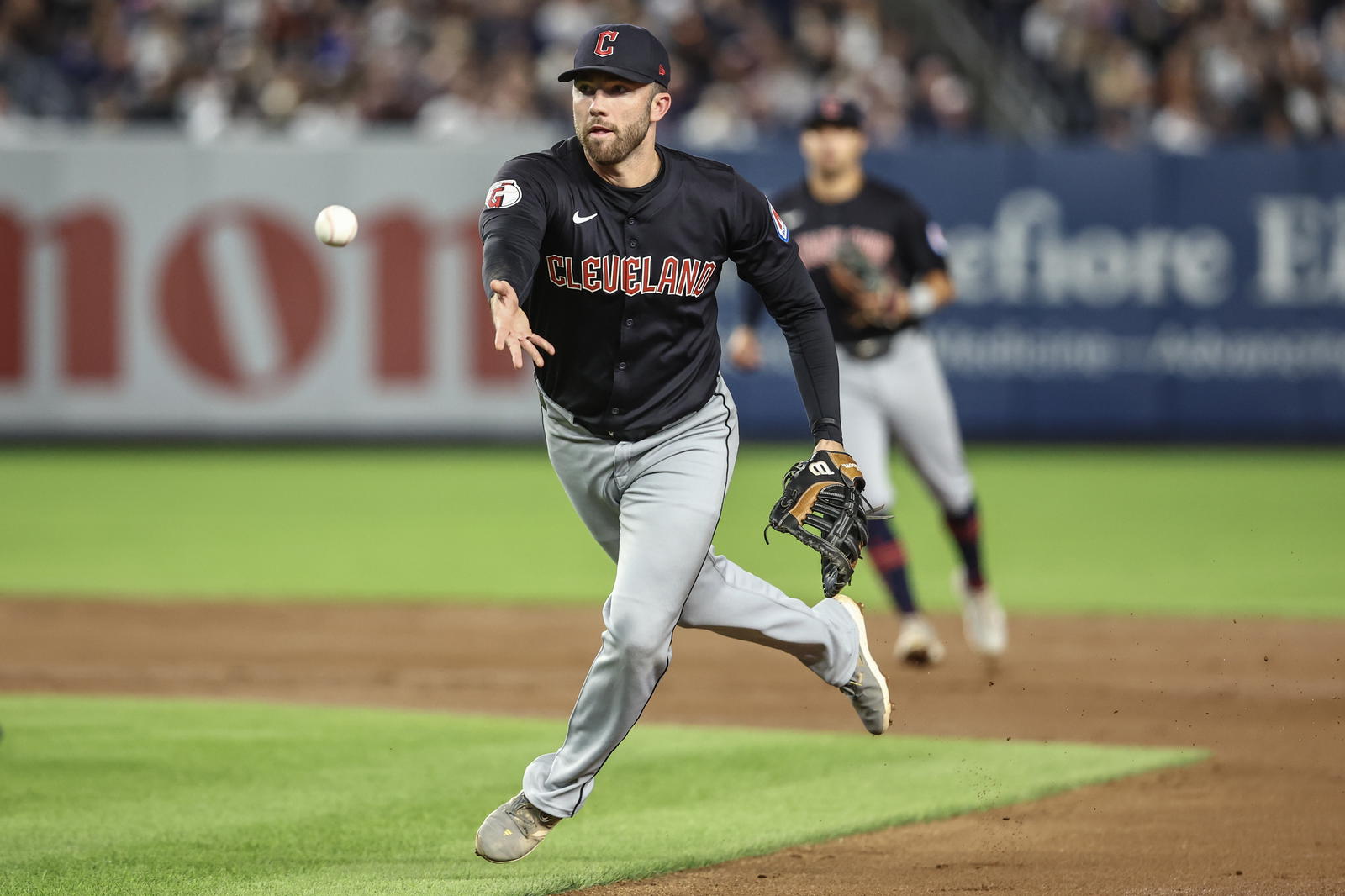 Aug 21, 2024; Bronx, New York, USA; Cleveland Guardians first baseman David Fry (6) flips the ball to first base in the fourth inning against the New York Yankees at Yankee Stadium. Mandatory Credit: Wendell Cruz-Imagn Images