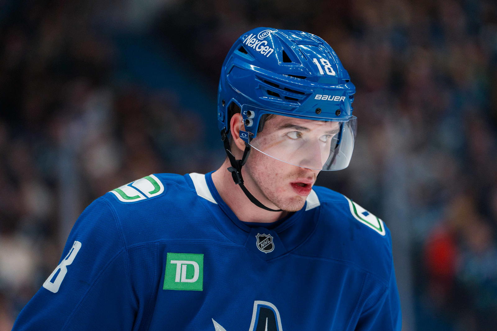 Mar 18, 2025; Vancouver, British Columbia, CAN; Vancouver Canucks forward Drew O'Connor (18) during a stop in play against the Winnipeg Jets in the first period at Rogers Arena. Mandatory Credit: Bob Frid-Imagn Images