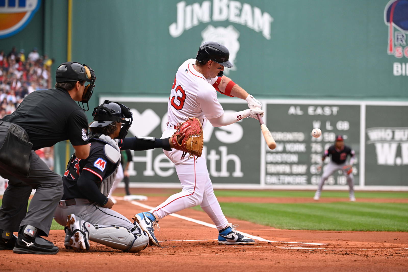 Boston Red Sox second baseman Romy Gonzalez (23) hits an RBI during the first inning against the Cleveland Guardians at Fenway Park. Eric Canha-Imagn Images