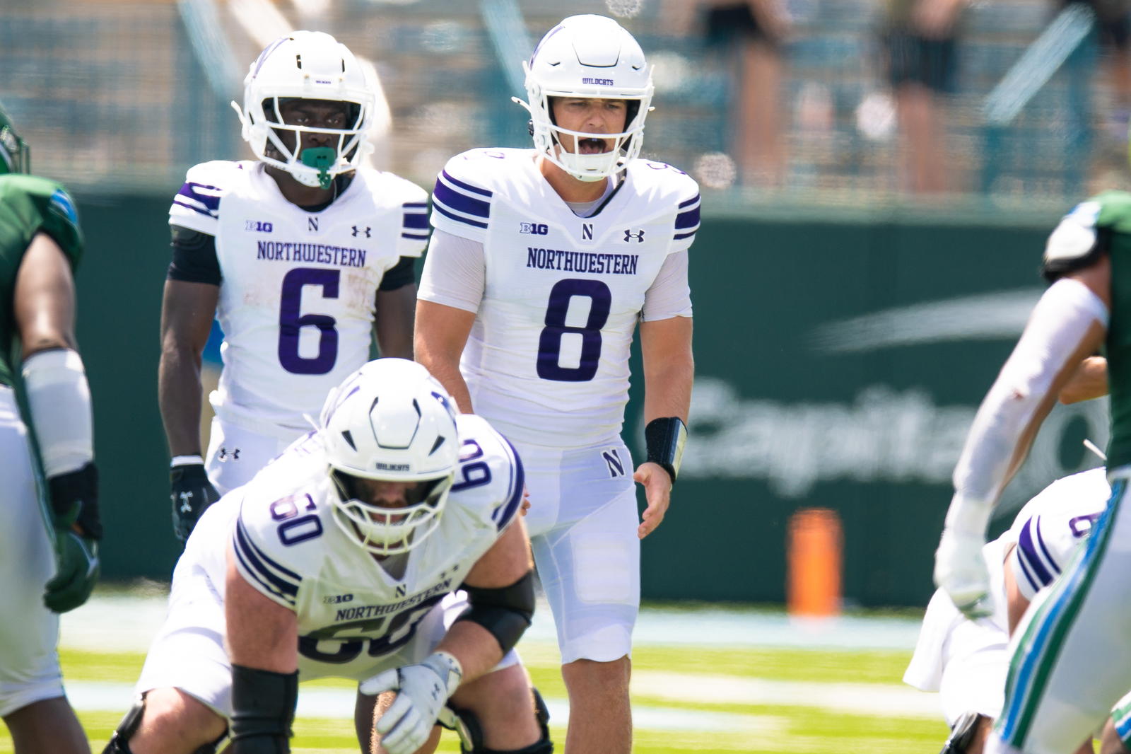 Aug 30, 2025; New Orleans, Louisiana, USA; Northwestern Wildcats quarterback Preston Stone (8) calls for the ball against Tulane Green Wave during the second half at Yulman Stadium. Mandatory Credit: Stephen Lew-Imagn Images
