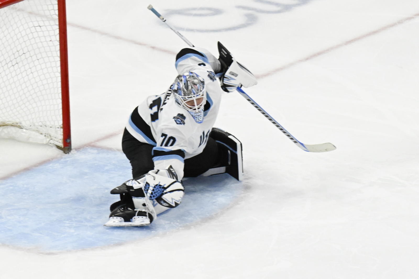 Mar 30, 2025; Chicago, Illinois, USA; Utah Hockey Club goaltender Karel Vejmelka (70) defends against the Chicago Blackhawks during the third period at United Center. Mandatory Credit: Matt Marton-Imagn Images