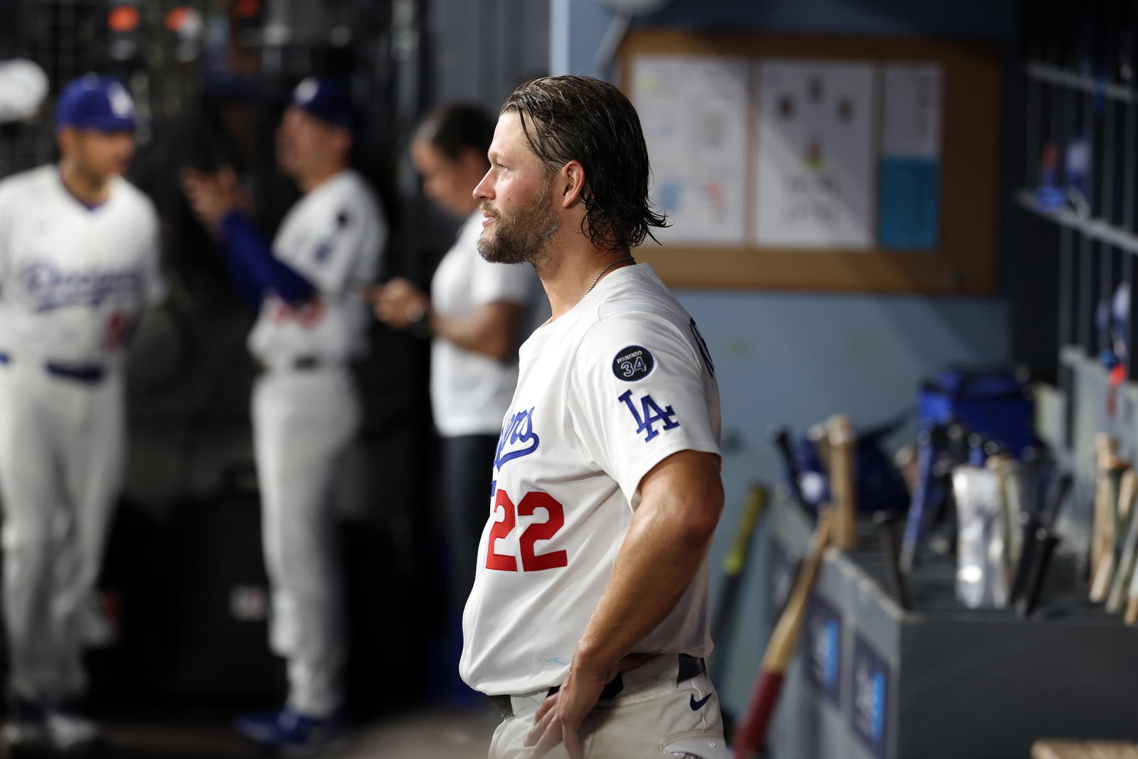 Los Angeles Dodgers pitcher Clayton Kershaw (22) looks on in the dugout after being relieved during the fifth inning against the San Francisco Giants at Dodger Stadium. Kiyoshi Mio-Imagn Images