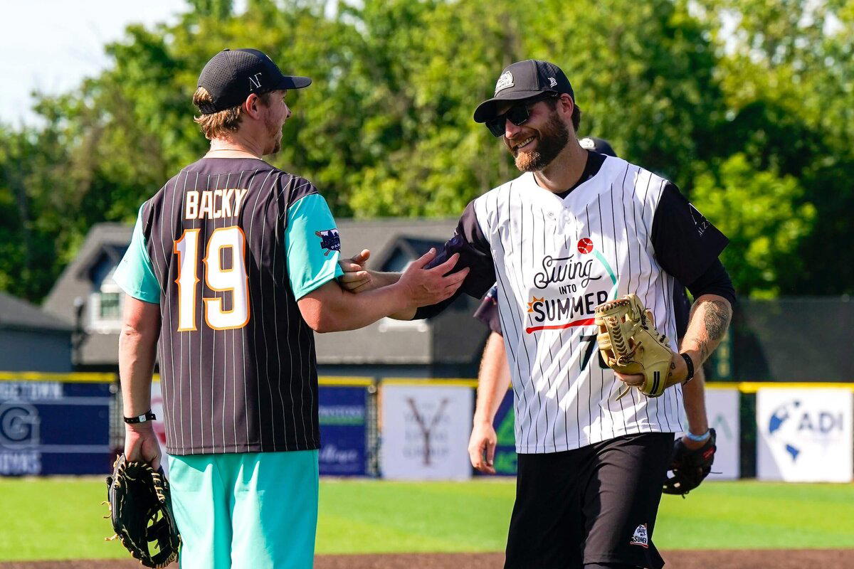 Nicklas Backstrom and Braden Holtby are among the current and former Capitals who will participate in the Swing Into Summer game on Saturday. (Phtoo courtesy of the Alzner Foundation)