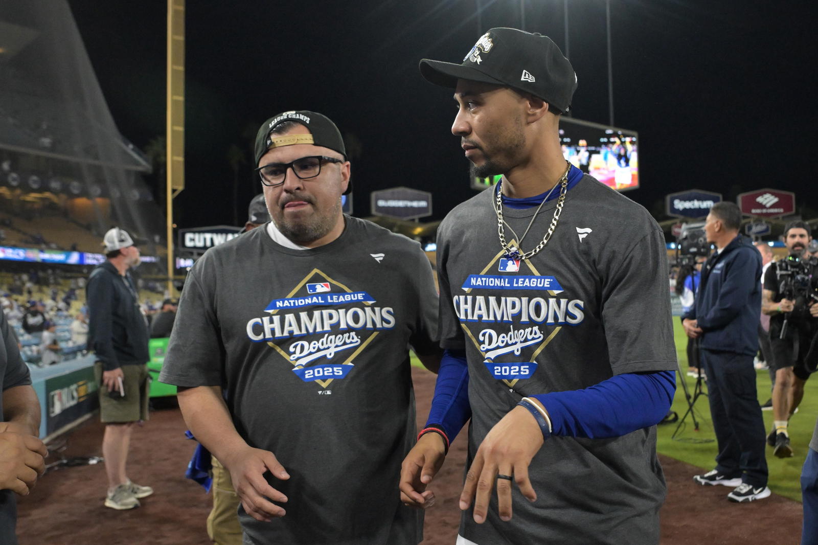 Oct 17, 2025; Los Angeles, California, USA; Los Angeles Dodgers shortstop Mookie Betts (50) celebrates after defeating the Milwaukee Brewers game four of the NLCS round for the 2025 MLB playoffs at Dodger Stadium. (Jayne Kamin Oncea/Imagn Images)
