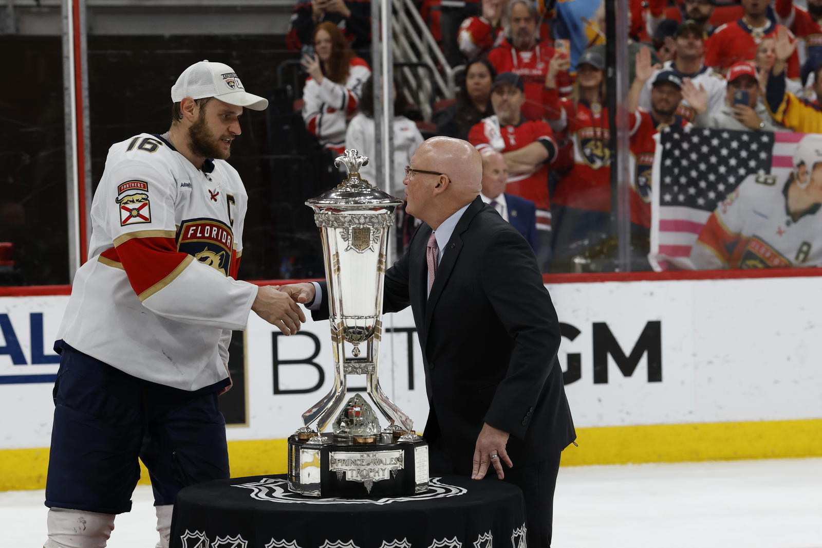Aleksander Barkov and Bill Daly (Geoff Burke-Imagn Images)