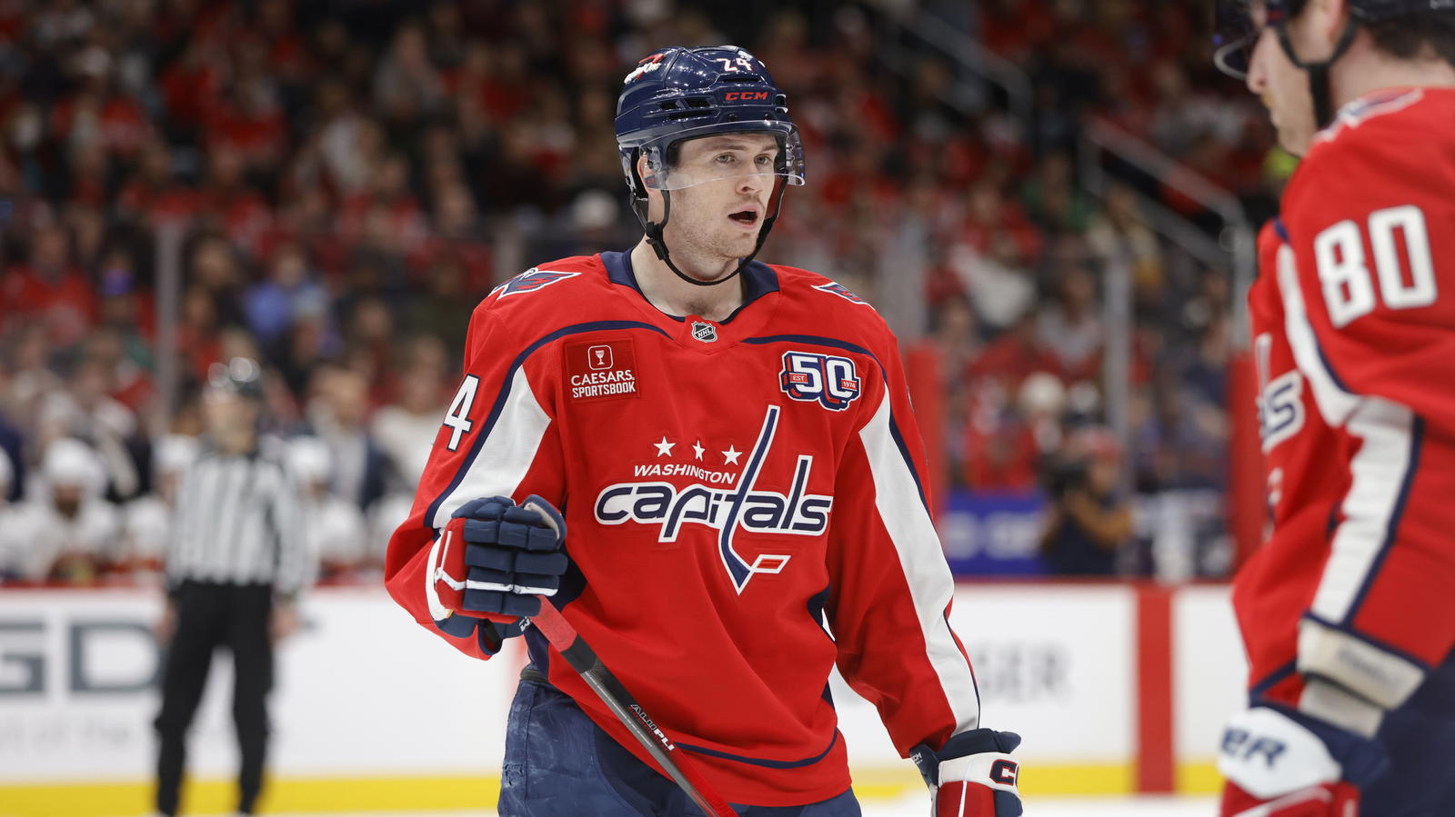 Mar 22, 2025; Washington, District of Columbia, USA; Washington Capitals center Connor McMichael (24) looks on from the ice against the Florida Panthers during the first period at Capital One Arena. (Amber Searls-Imagn Images)