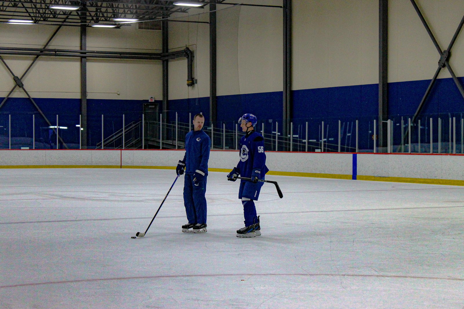 Practice: Canucks forward Wilson Björck chats with a Sedin.&nbsp;&nbsp;