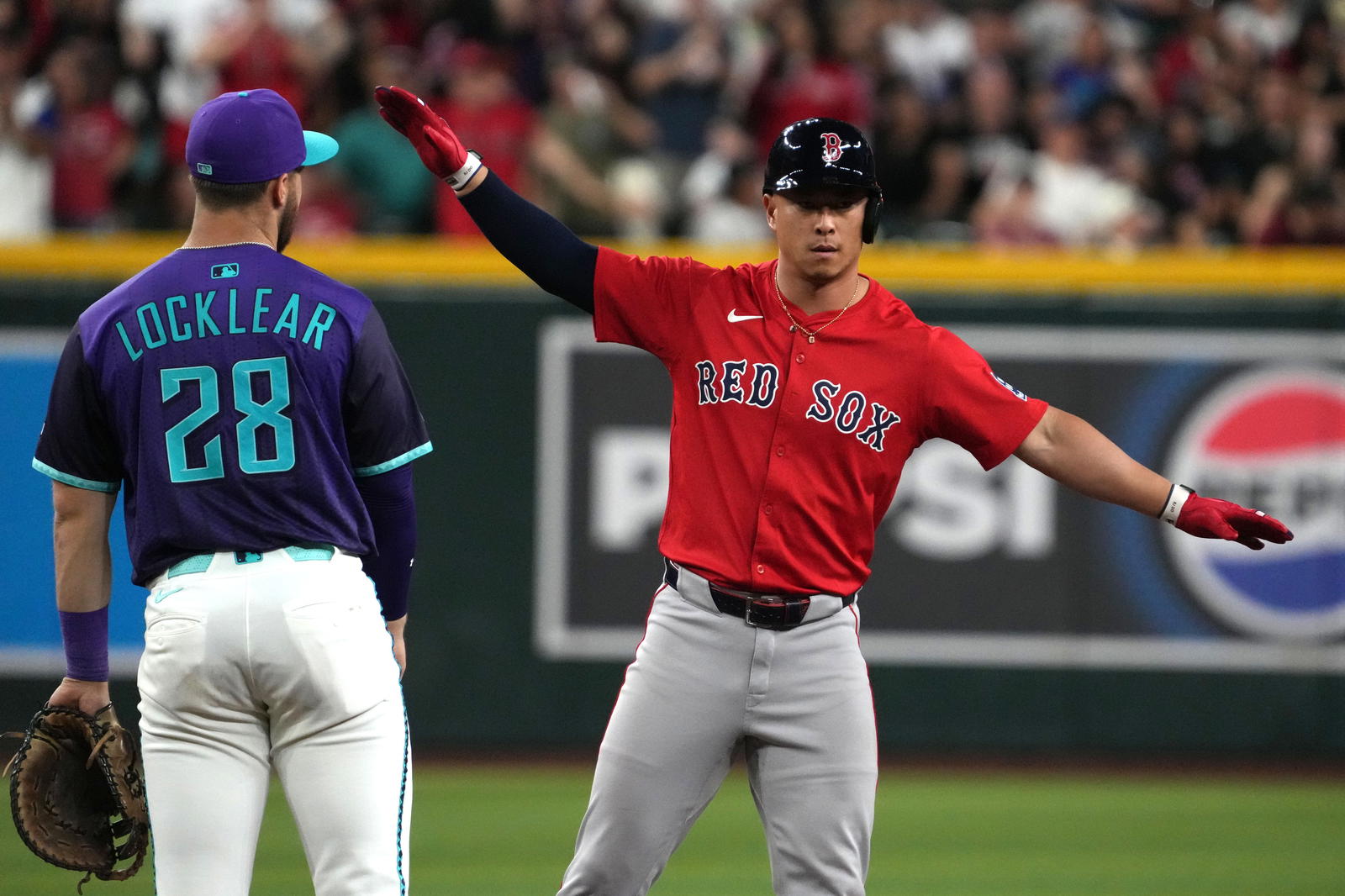 Sep 5, 2025; Phoenix, Arizona, USA; Boston Red Sox outfielder Rob Refsnyder (30) reacts after hitting an RBI double against the Arizona Diamondbacks in the eighth inning at Chase Field. (Rick Scuteri/Imagn Images)