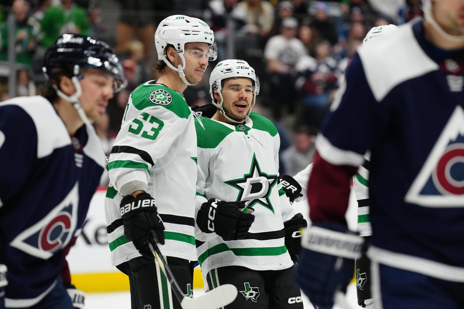 Feb 27, 2024; Denver, Colorado, USA; Dallas Stars center Logan Stankoven (11) celebrates his goal with center Wyatt Johnston (53) in the first period against the Colorado Avalanche at Ball Arena. (Ron Chenoy-Imagn Images)