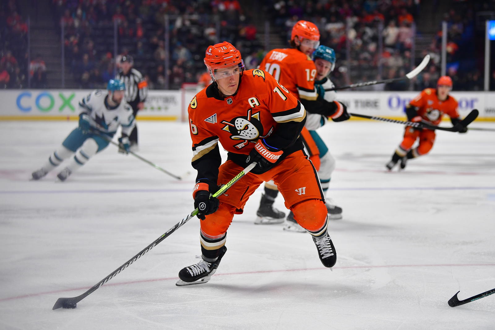 Apr 1, 2025; Anaheim, California, USA; Anaheim Ducks center Ryan Strome (16) controls the puck against the San Jose Sharks during the second period at Honda Center. Mandatory Credit: Gary A. Vasquez-Imagn Images