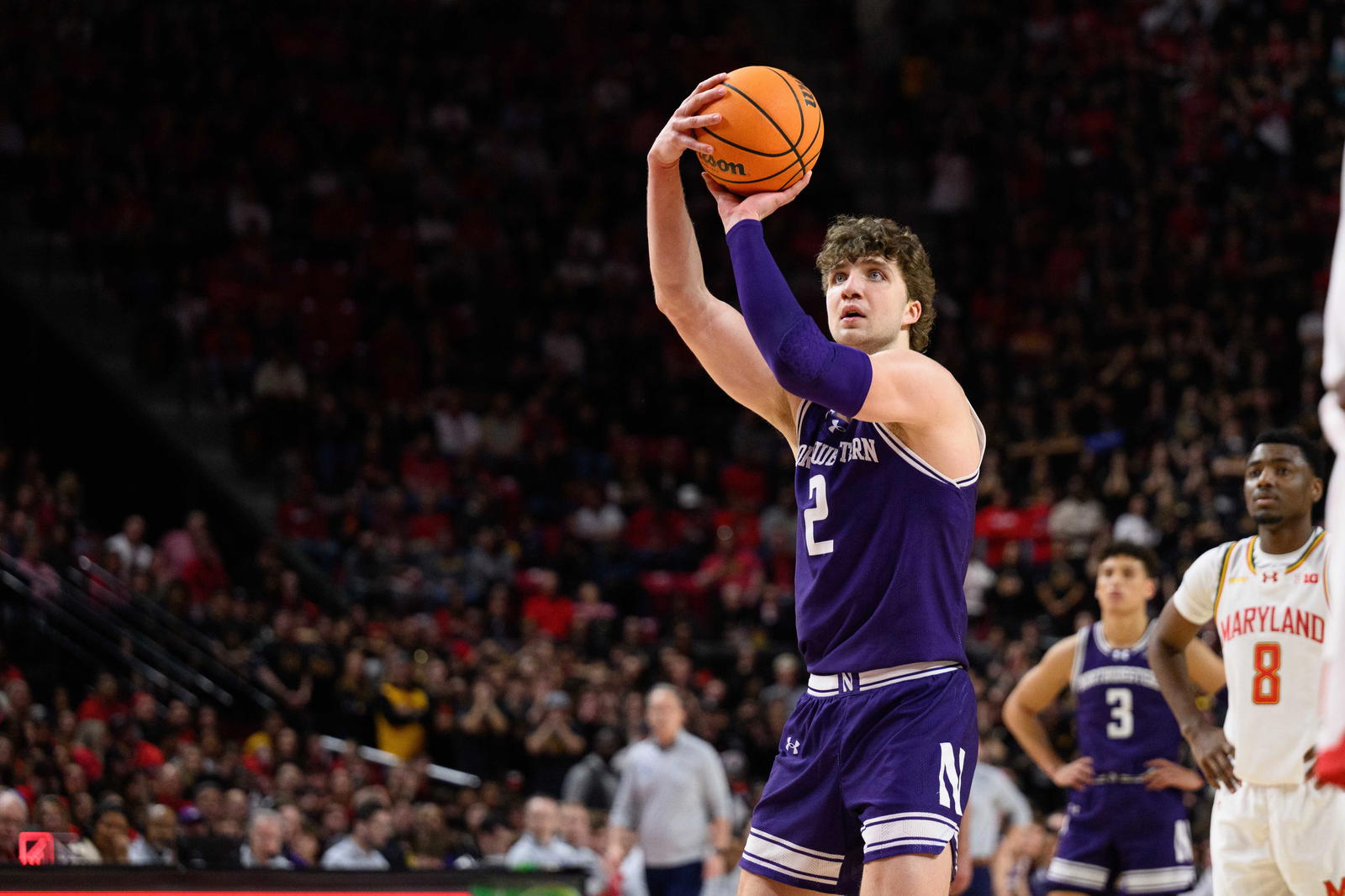 Mar 8, 2025; College Park, Maryland, USA; Northwestern Wildcats forward Nick Martinelli (2) shoots a free throw during the first half against the Maryland Terrapins at Xfinity Center. Mandatory Credit: Reggie Hildred-Imagn Images