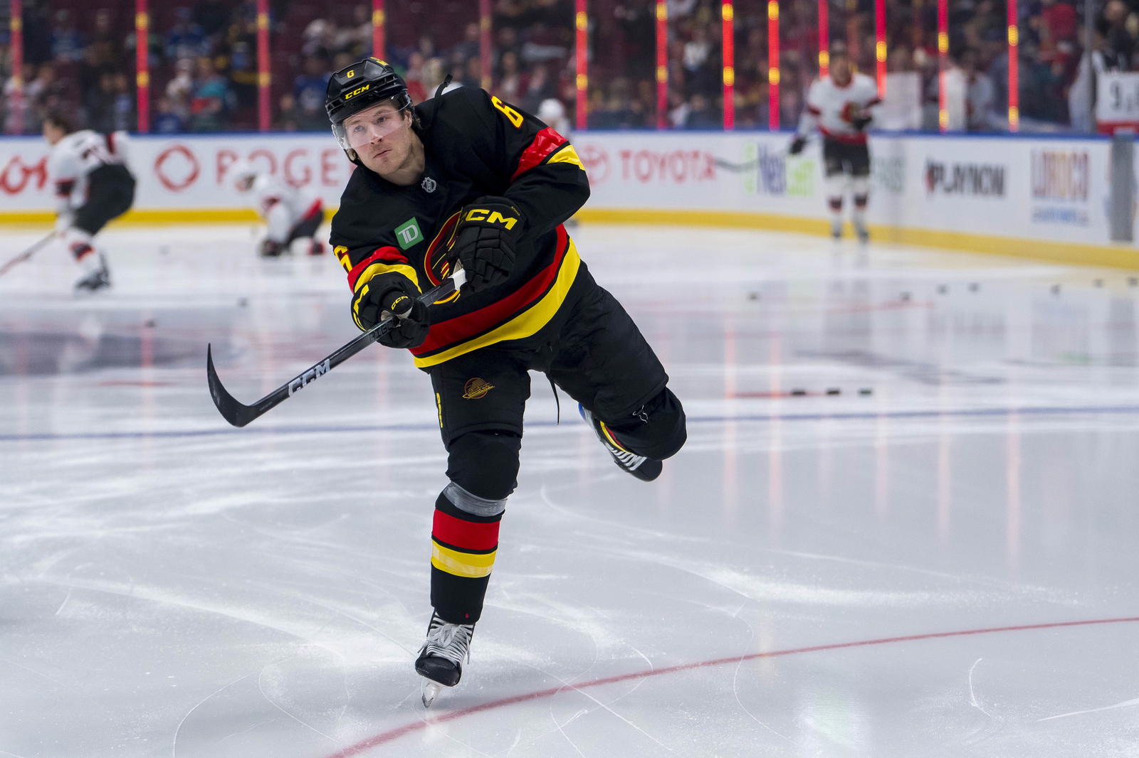 Dec 21, 2024; Vancouver, British Columbia, CAN; Vancouver Canucks forward Brock Boeser (6) shoots during warm up prior to a game against the Ottawa Senators at Rogers Arena. Mandatory Credit: Bob Frid-Imagn Images