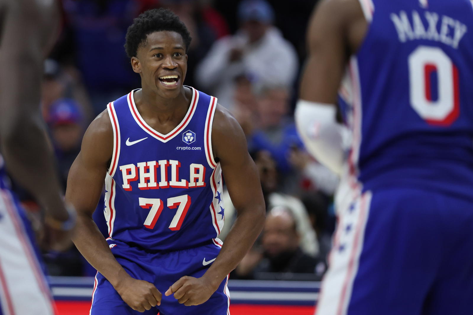 Oct 27, 2025; Philadelphia, Pennsylvania, USA; Philadelphia 76ers guard VJ Edgecombe (77) reacts to guard Tyrese Maxey (0) three pointer against the Orlando Magic during the fourth quarter at Xfinity Mobile Arena. Mandatory Credit: Bill Streicher-Imagn Images