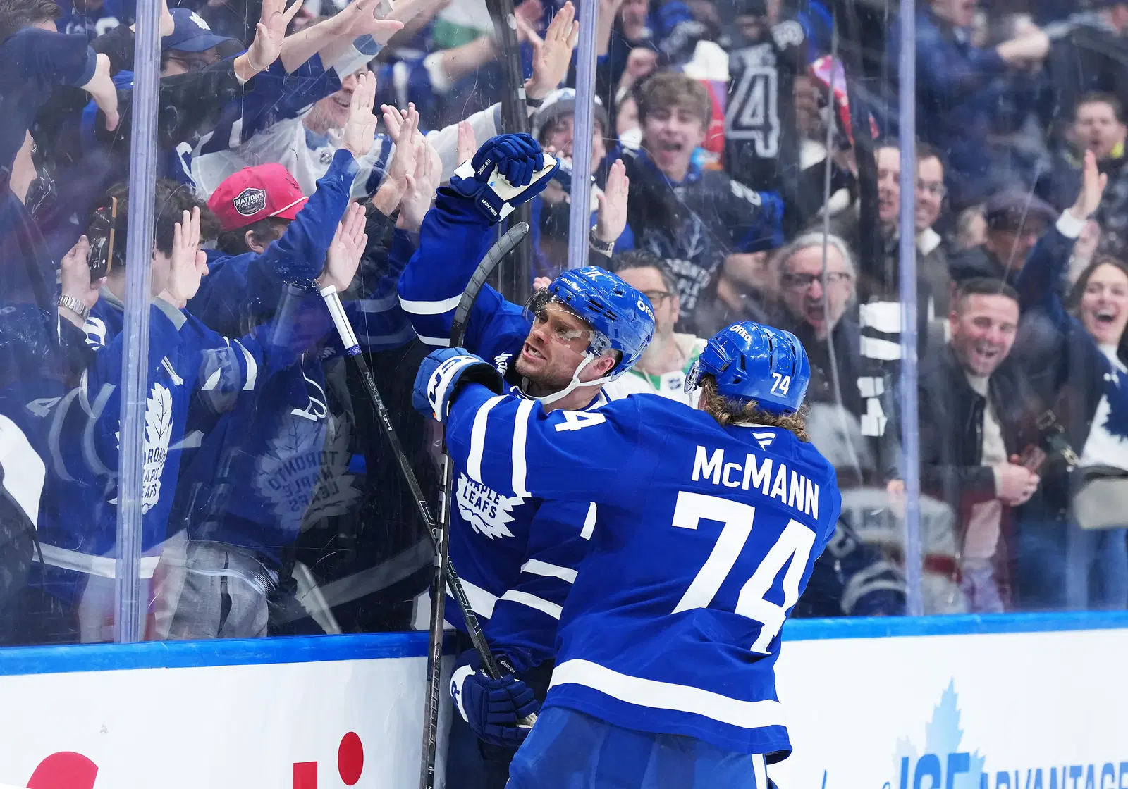 Mar 13, 2025; Toronto, Ontario, CAN; Toronto Maple Leafs center Max Domi (11) scores a goal and celebrates with center Bobby McMann (74) against the Florida Panthers during the third period at Scotiabank Arena. Mandatory Credit: Nick Turchiaro-Imagn Images