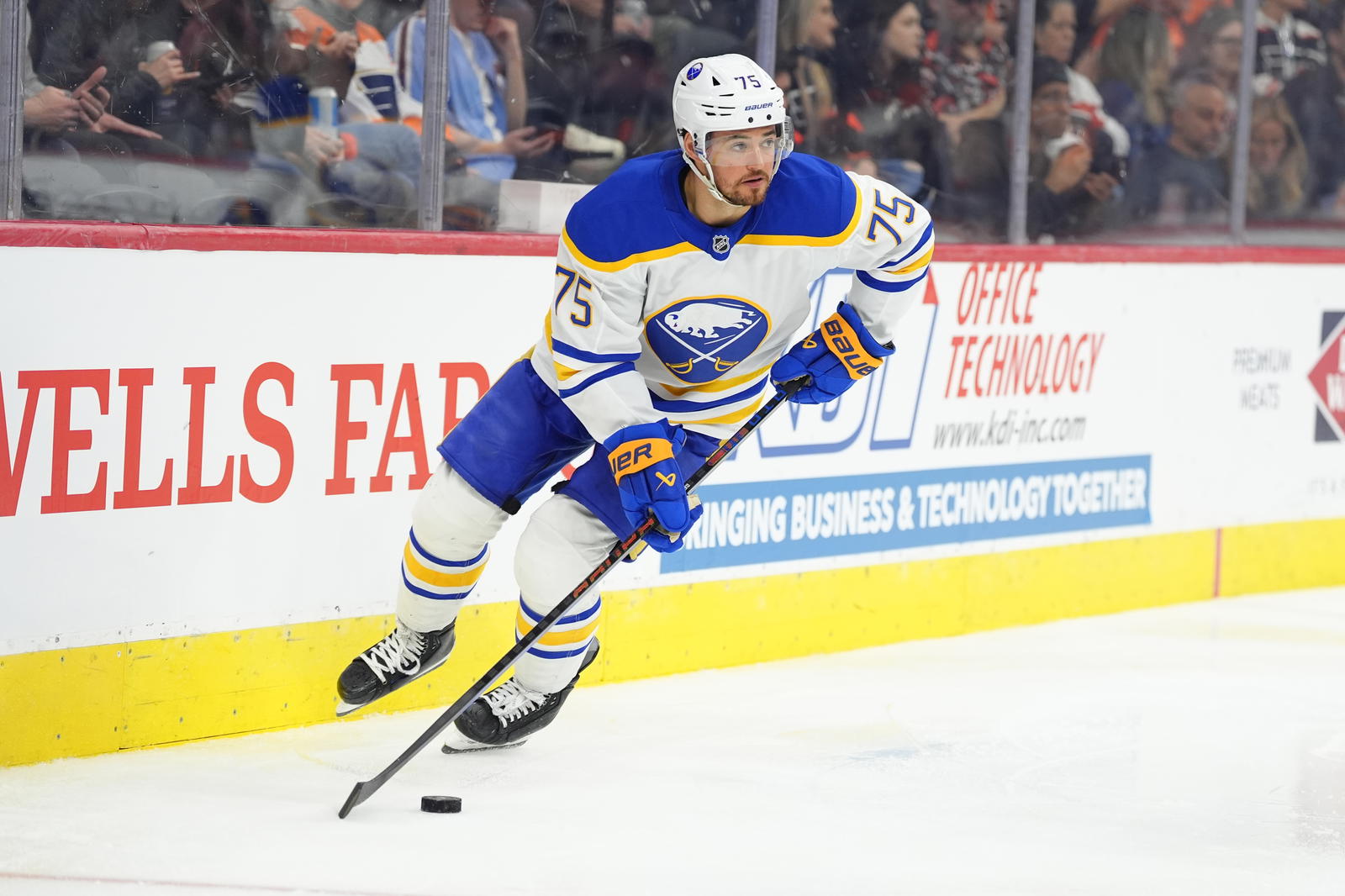 Mar 29, 2025; Philadelphia, Pennsylvania, USA; Buffalo Sabres defenseman Connor Clifton (75) controls the puck against the Philadelphia Flyers in the second period at Wells Fargo Center. Mandatory Credit: Kyle Ross-Imagn Images