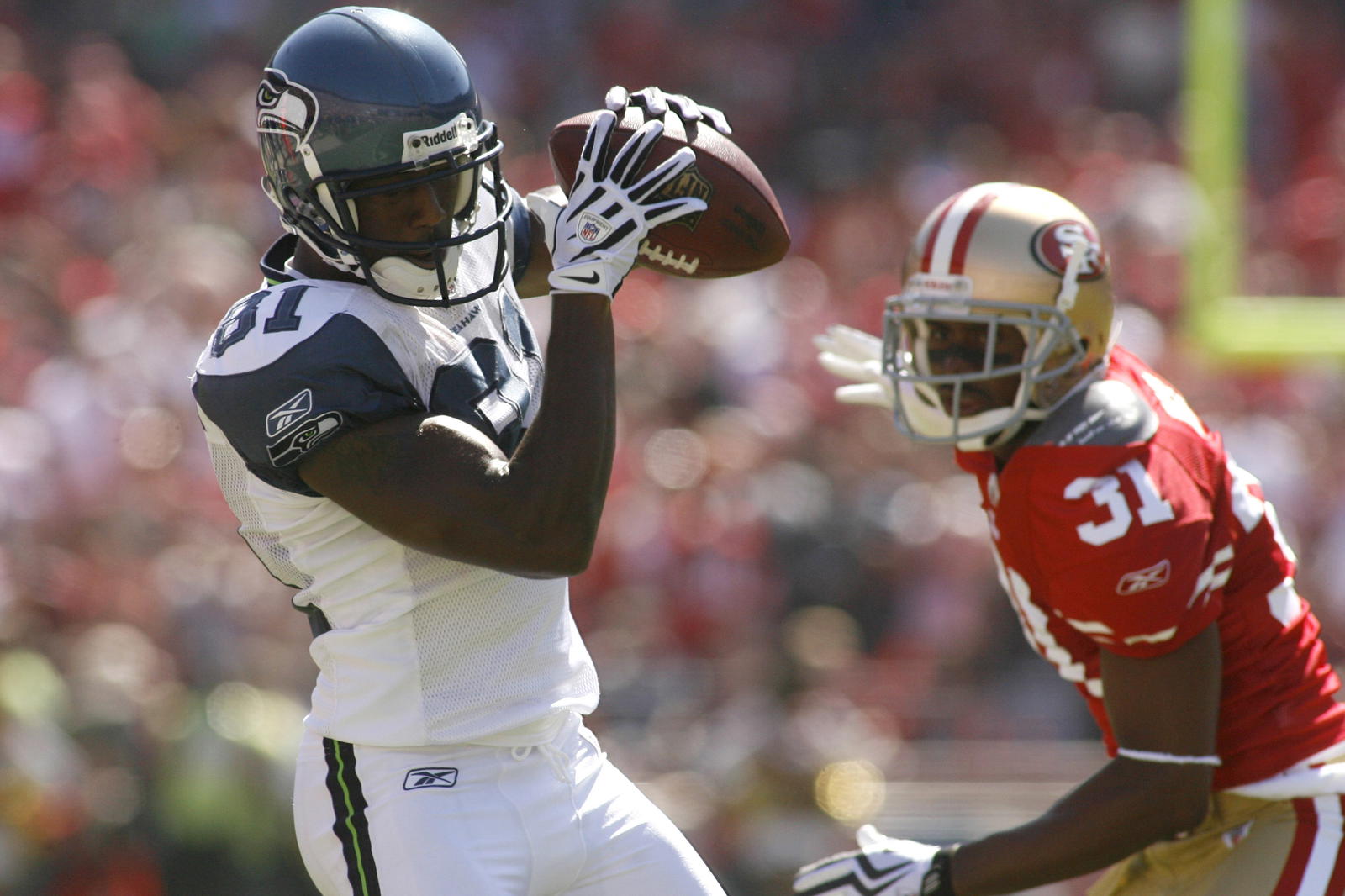 Seattle Seahawks wide receiver Nate Burleson (81) makes a catch during a game against the San Francisco 49ers on Sept. 20, 2009, at Candlestick Park in San Francisco. - Carly Edmondson/Imagn Images