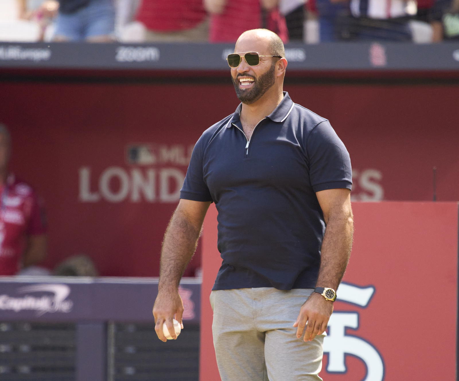 St. Louis Cardinals former first baseman Albert Pujols walks on the field before throwing out a ceremonial first pitch before London series game two against the Chicago Cubs at London Stadium. Peter van den Berg-Imagn Images