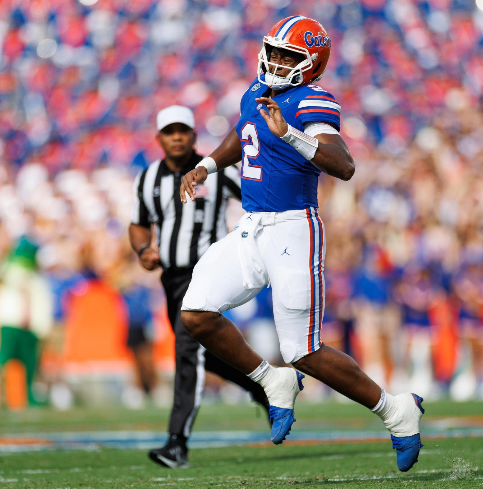On the Gators' second possession, Lagway aggravated a lower leg injury. In the second half, he wore what appeared to be a calf-length compression sleeve. © Matt Pendleton