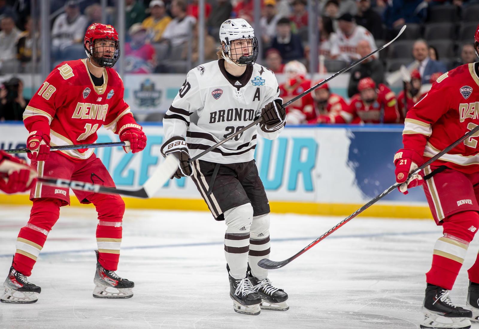 Western Michigan Broncos forward Alex Bump (20) looks to enter the play&nbsp;against the Denver University Pioneers in the 2025 Frozen Four Semi-Final Game. - © Adam Sheehan WMU Athletics/Detroit News 