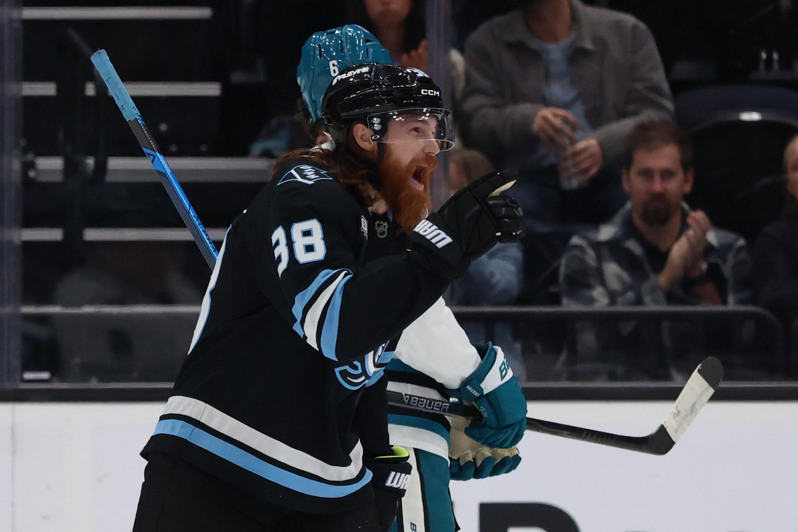 Oct 17, 2025; Salt Lake City, Utah, USA; Utah Mammoth center Liam O'Brien (38) celebrates after scoring his first Utah Mammoth goal against the San Jose Sharks during the second period at Delta Center. &nbsp;(Rob Gray-Imagn Images)