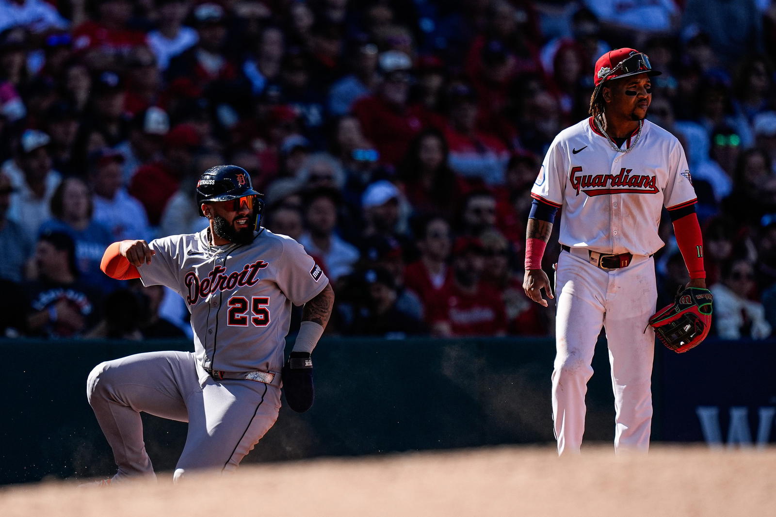 Detroit Tigers second base Gleyber Torres (25) takes third base against Cleveland Guardians third base José Ramírez (11) during the seventh inning of Game 2 of AL wild-card series at Progressive Field in Cleveland, Ohio on Wednesday, Oct. 1, 2025.