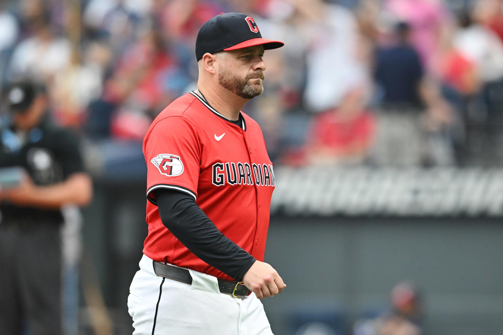 Jun 8, 2025; Cleveland, Ohio, USA; Cleveland Guardians manager Stephen Vogt (12) walks back to the dugout after a pitching change during the seventh inning against the Houston Astros at Progressive Field. Mandatory Credit: Ken Blaze-Imagn Images