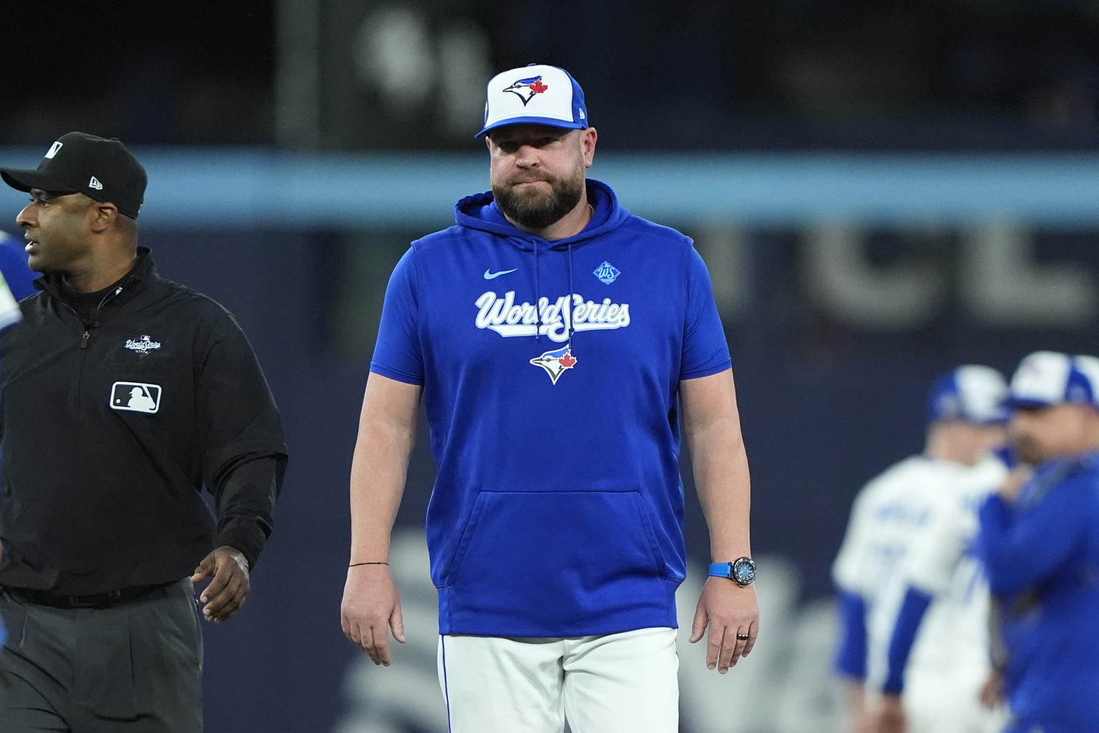 Toronto Blue Jays manager John Schneider (14) reacts after the benches clear in the fourth inning against the Los Angeles Dodgers during game seven of the 2025 MLB World Series at Rogers Centre. John E. Sokolowski-Imagn Images