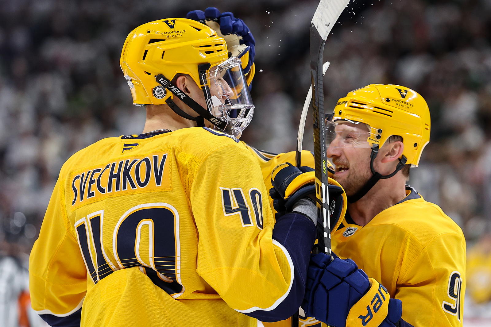 Nov 30, 2024; Saint Paul, Minnesota, USA; Nashville Predators center Fedor Svechkov (40) celebrates his goal with center Steven Stamkos (91) during the first period against the Minnesota Wild at Xcel Energy Center. Mandatory Credit: Matt Krohn-Imagn Images