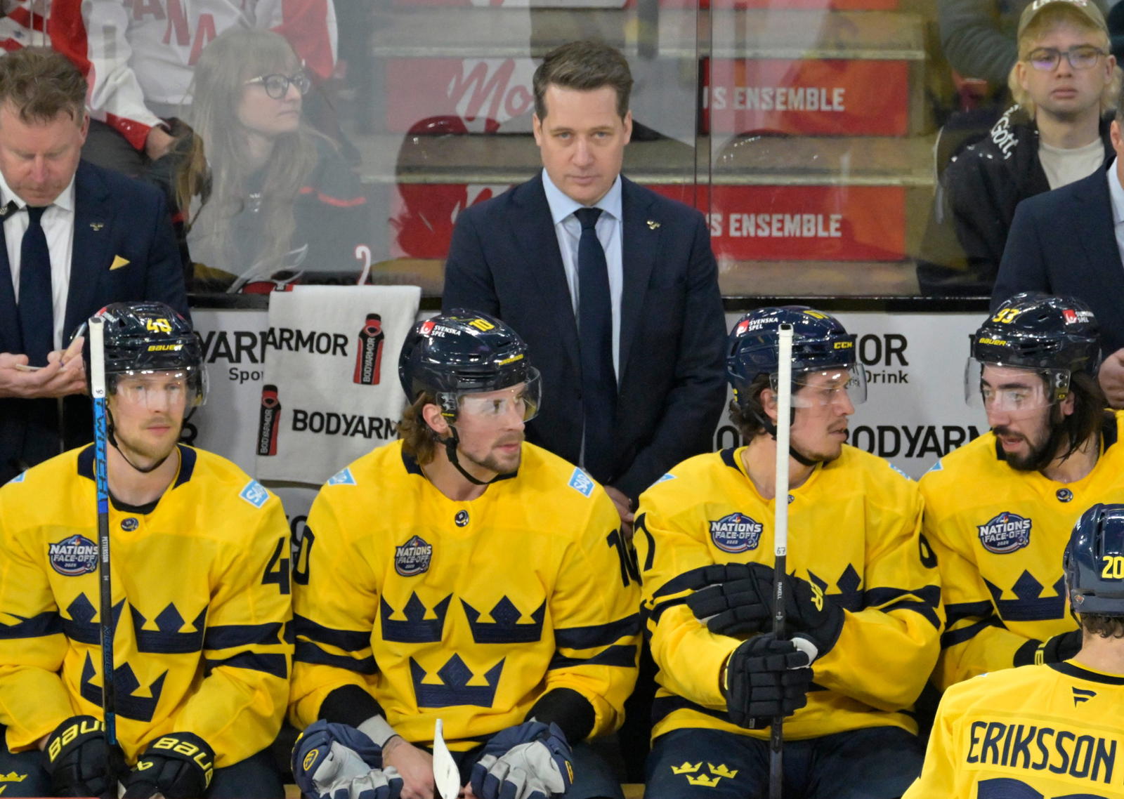 Sam Hallam behind the Swedish bench during the 4 Nations Face-Off. © Eric Bolte-Imagn Images