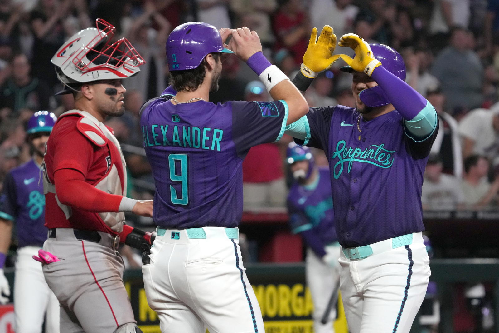 Sep 5, 2025; Phoenix, Arizona, USA; Arizona Diamondbacks second base Ildemaro Vargas (6) celebrates with shortstop Blaze Alexander (9) after hitting a three run home run against the Boston Red Sox in the third inning at Chase Field. (Rick Scuteri/Imagn Images)