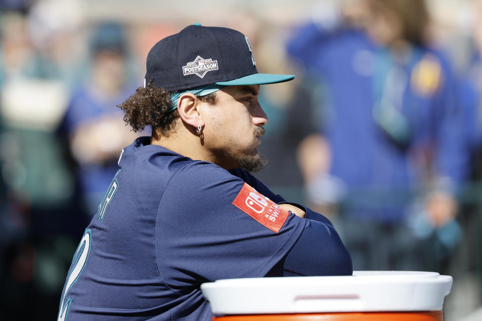 Oct 8, 2025; Detroit, Michigan, USA; Seattle Mariners first baseman Josh Naylor (12) stands in the dugout prior to game four of the ALDS round for the 2025 MLB playoffs against the Detroit Tigers at Comerica Park. Mandatory Credit: Rick Osentoski-Imagn Images