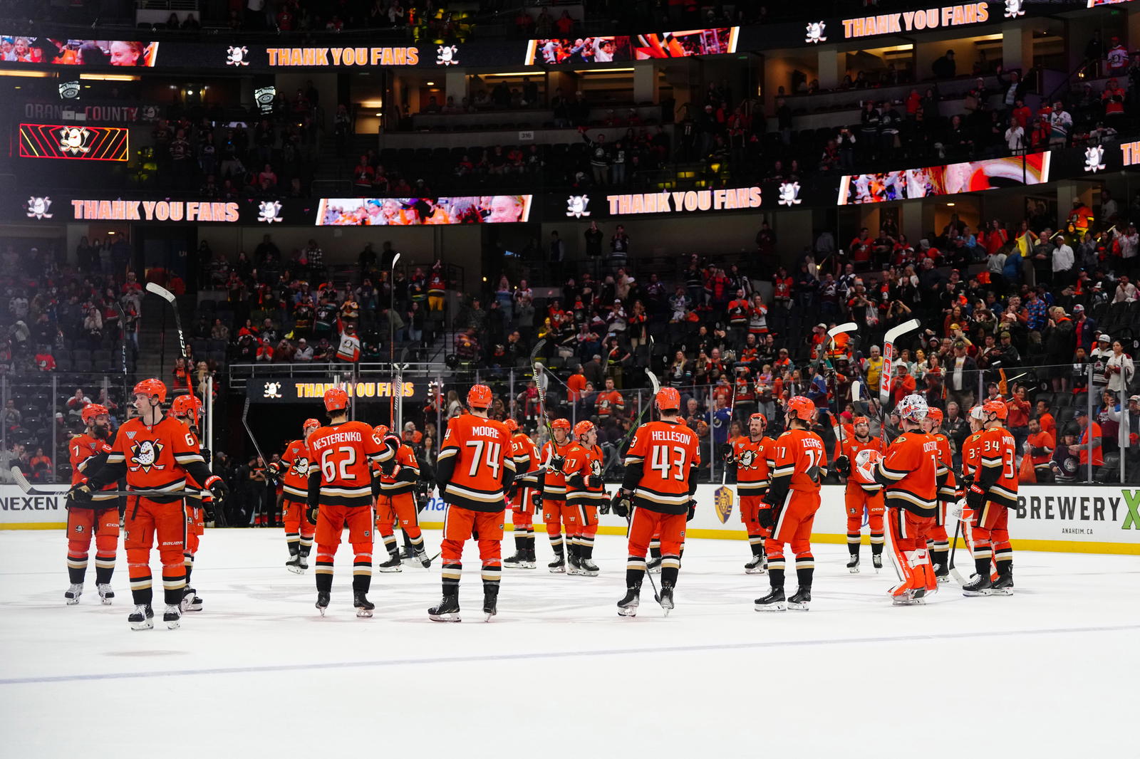 Apr 13, 2025; Anaheim, California, USA; Anaheim Ducks players acknowledge the crowd after a game against the Colorado Avalanche at the Honda Center. Mandatory Credit: Kirby Lee-Imagn Images