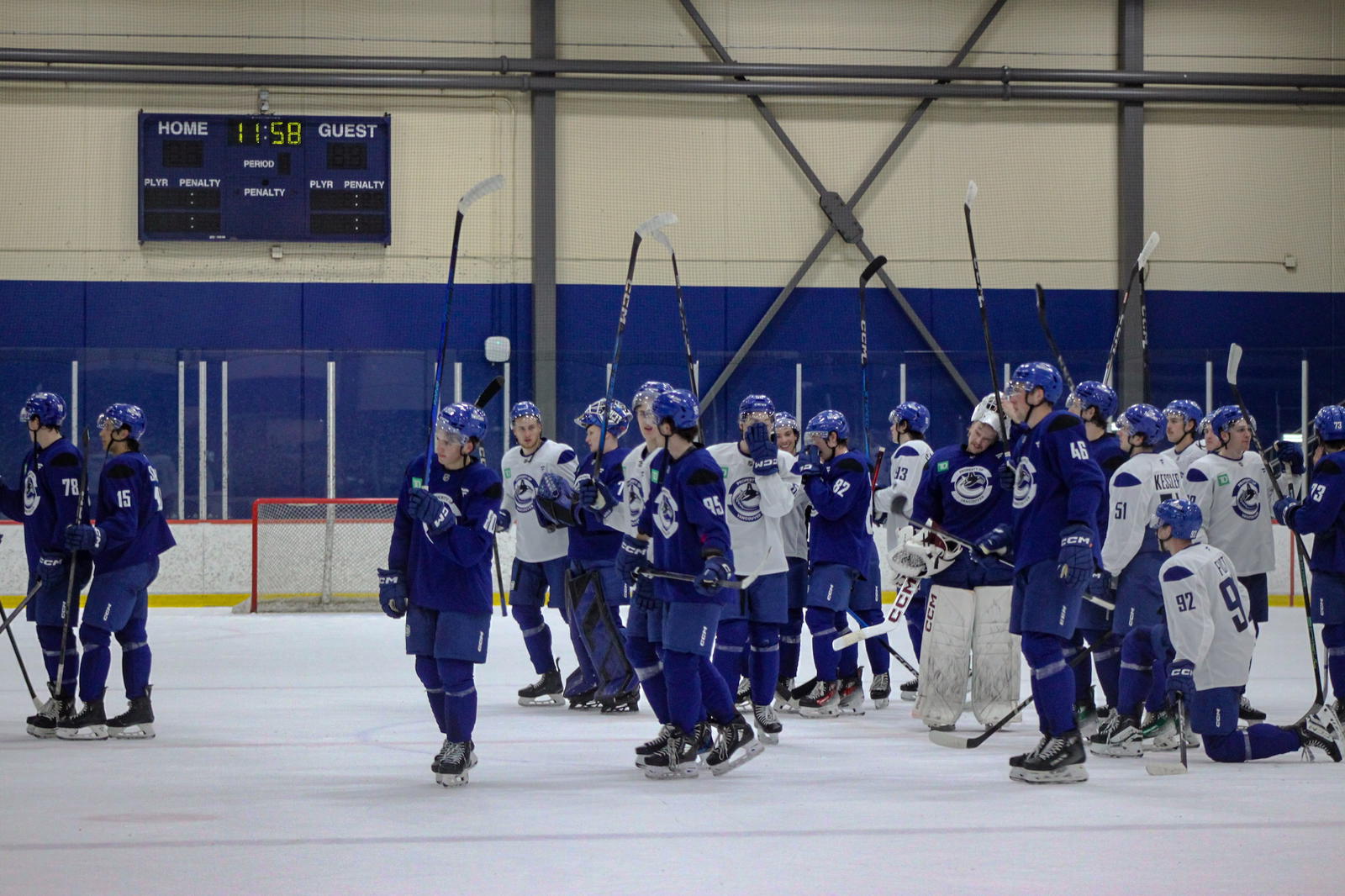 Scrimmage: Canucks prospects and camp invitees salute the crowd at UBC.&nbsp;