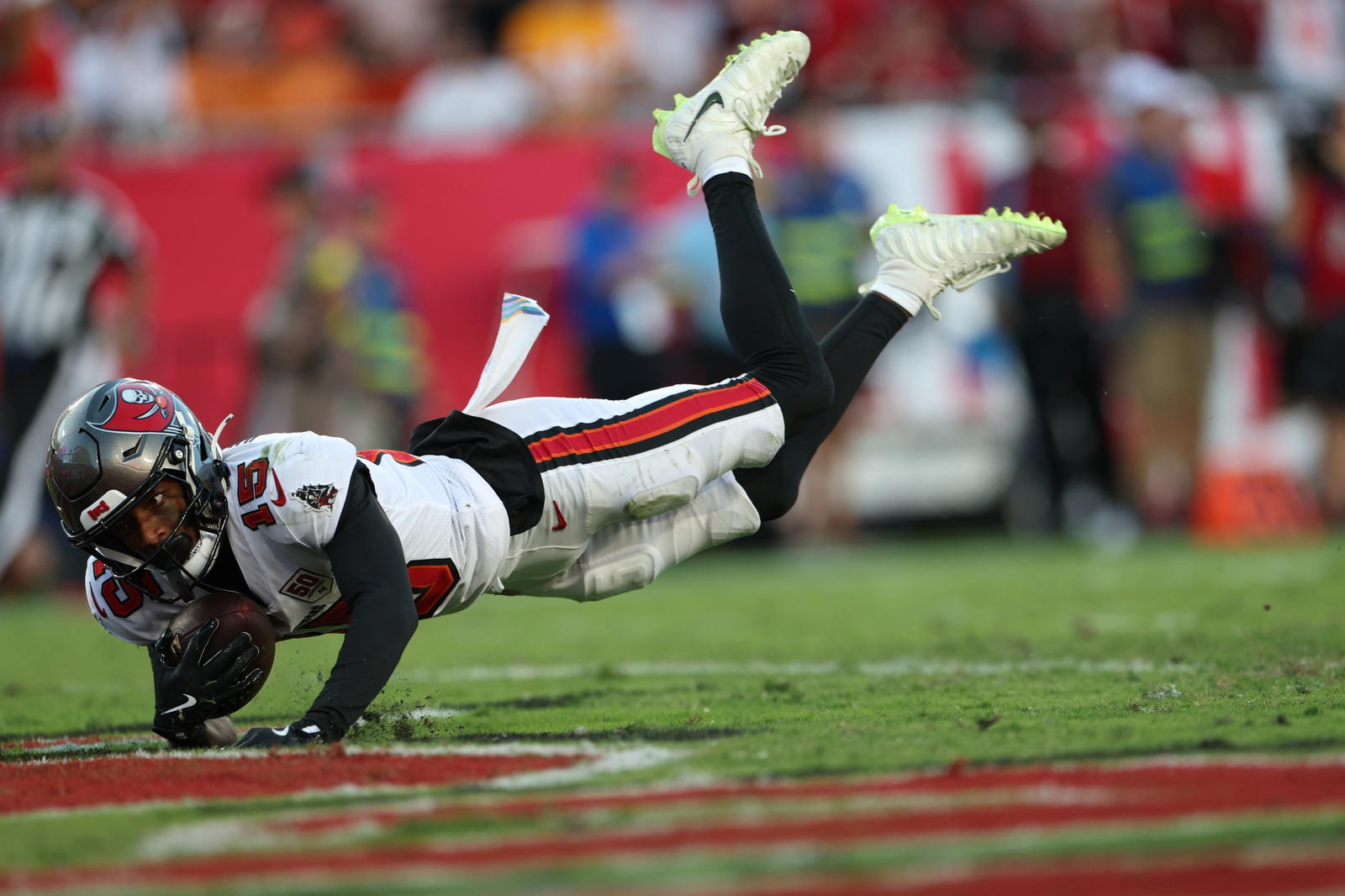 Tez Johnson falls to turf with his big TD grab. @Nathan Ray Seebeck&nbsp;