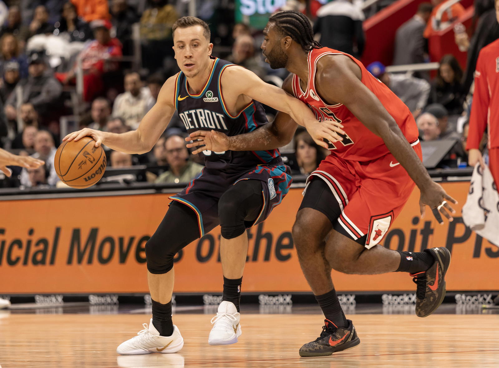 Chicago Bulls forward Patrick Williams (44) defends against Detroit Pistons forward Duncan Robinson (55) during the second quarter at Little Caesars Arena. Mandatory Credit: David Reginek-Imagn Images