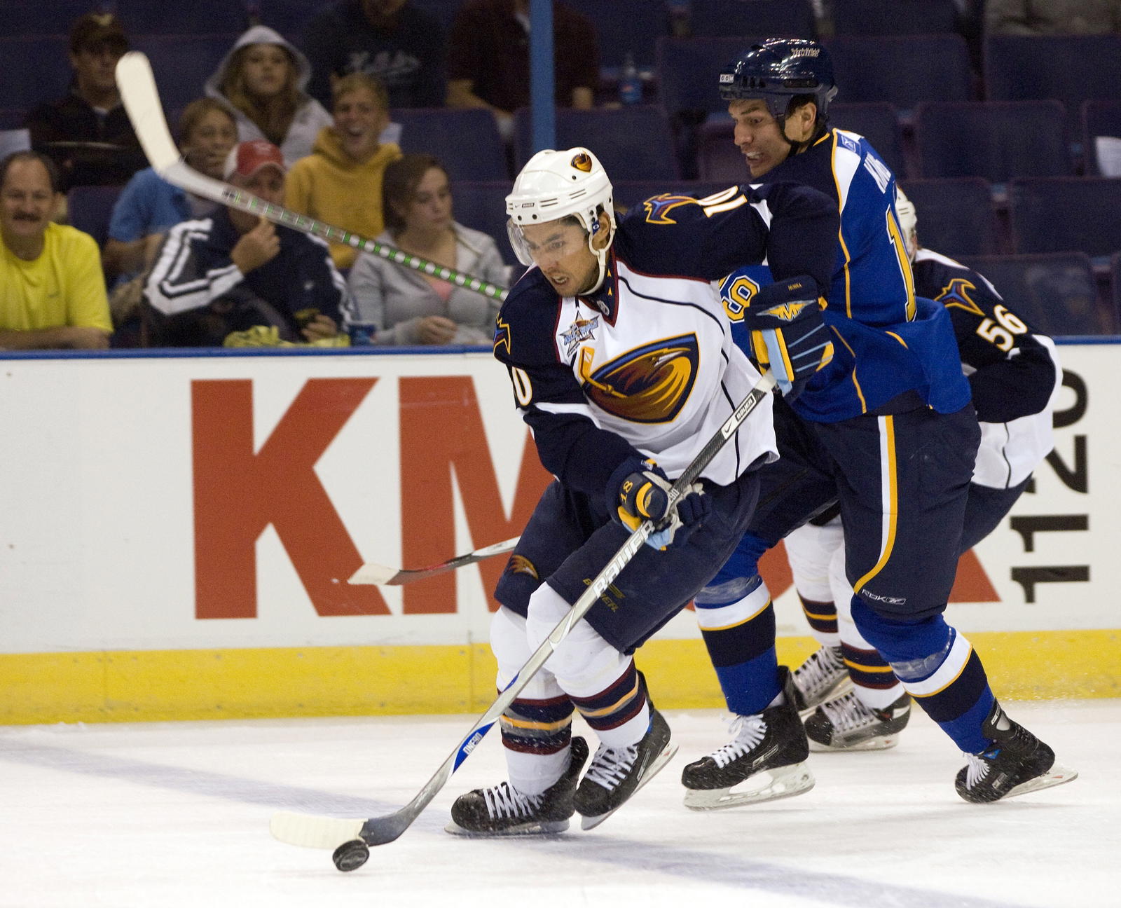 Sep 16, 2007; St. Louis, MO, USA; Atlanta Thrashers forward Jason Krog (10) skates up ice as St. Louis Blues forward Dwayne King (19) follows during the second period at the Scottrade Center in St. Louis, MO. Mandatory Credit:Scott Rovak-Imagn Images Copyright © Scott Rovak