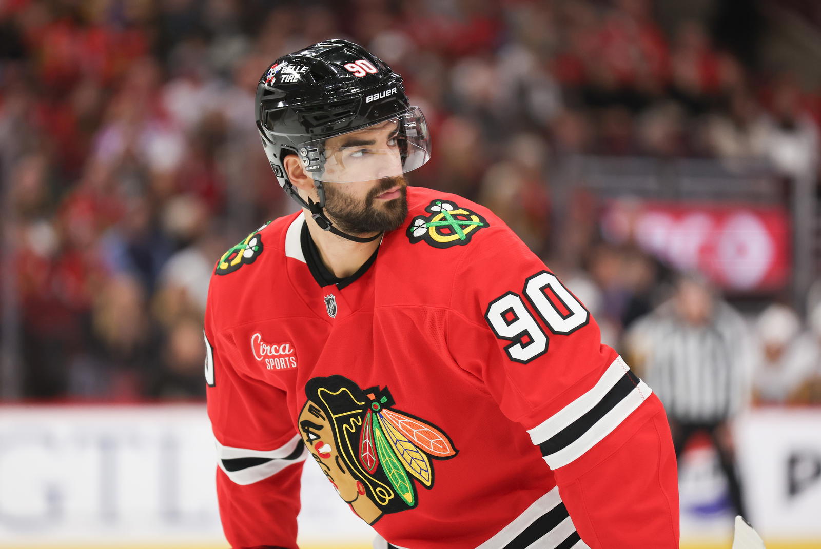 Chicago Blackhawks center Joe Veleno (90) waits for a faceoff during the first period against the Pittsburgh Penguins at United Center. Mandatory Credit: Talia Sprague-Imagn Images