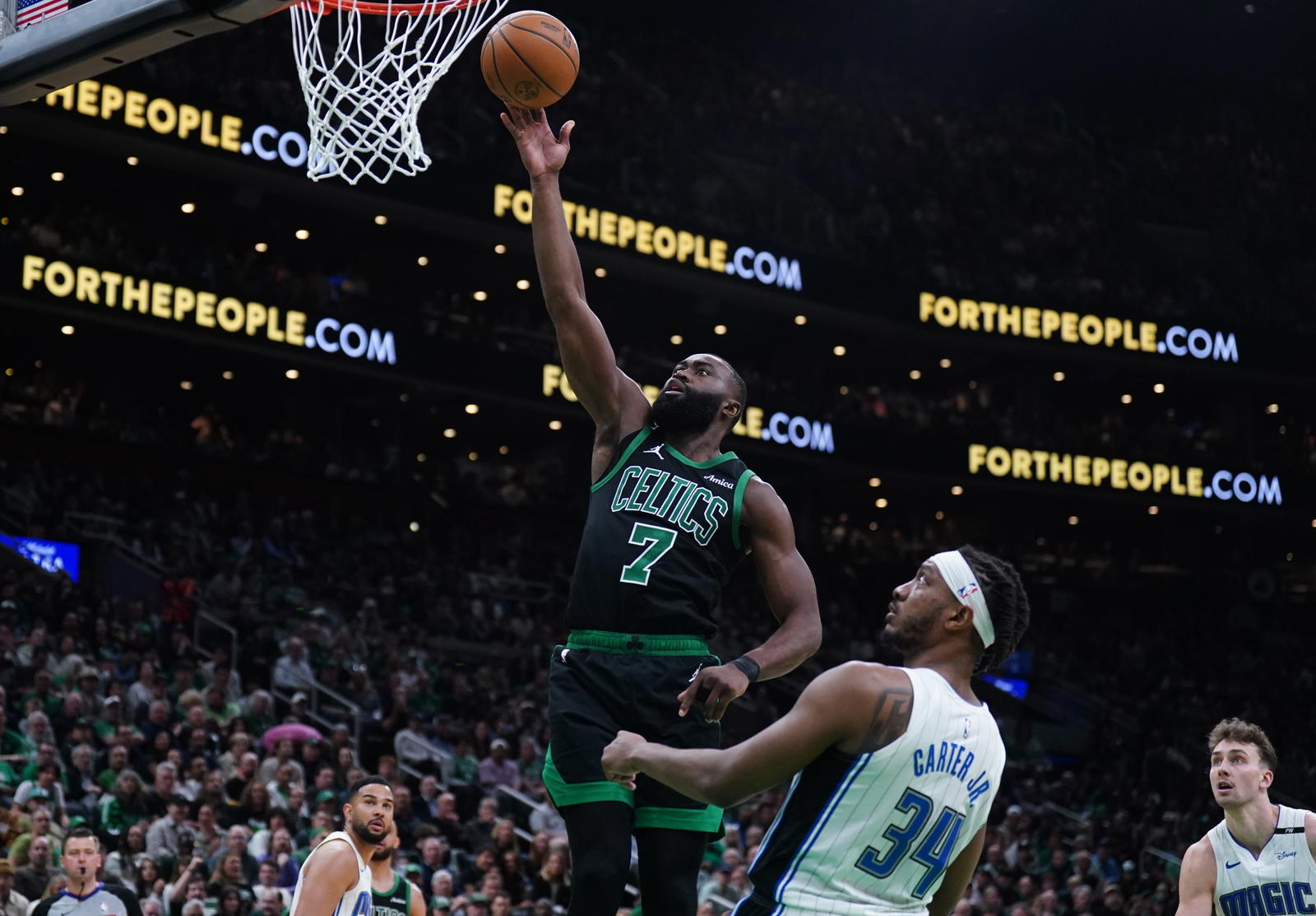 Apr 29, 2025; Boston, Massachusetts, USA; Boston Celtics guard Jaylen Brown (7) drivers the ball to the basket against the Orlando Magic in the third quarter during game five of first round for the 2025 NBA Playoffs at TD Garden. (David Butler II/Imagn Images)