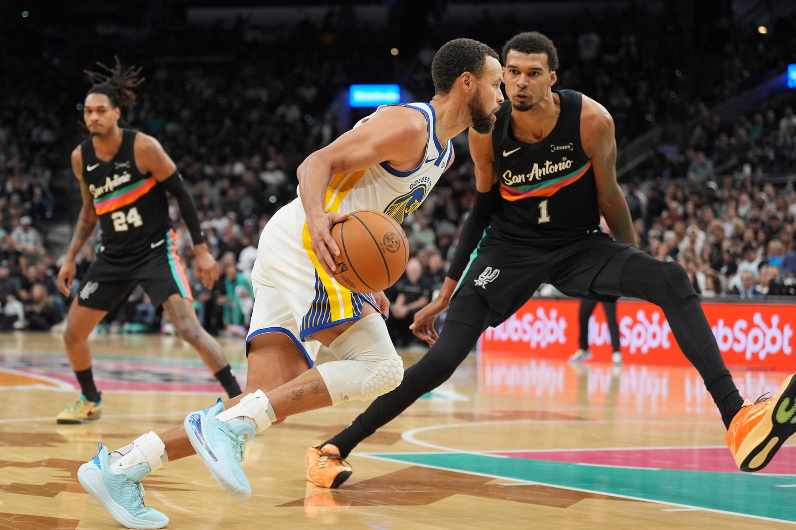 Golden State Warriors guard Stephen Curry (30) dribbles against San Antonio Spurs forward Victor Wembanyama (1) in the second half at Frost Bank Center. Daniel Dunn-Imagn Images