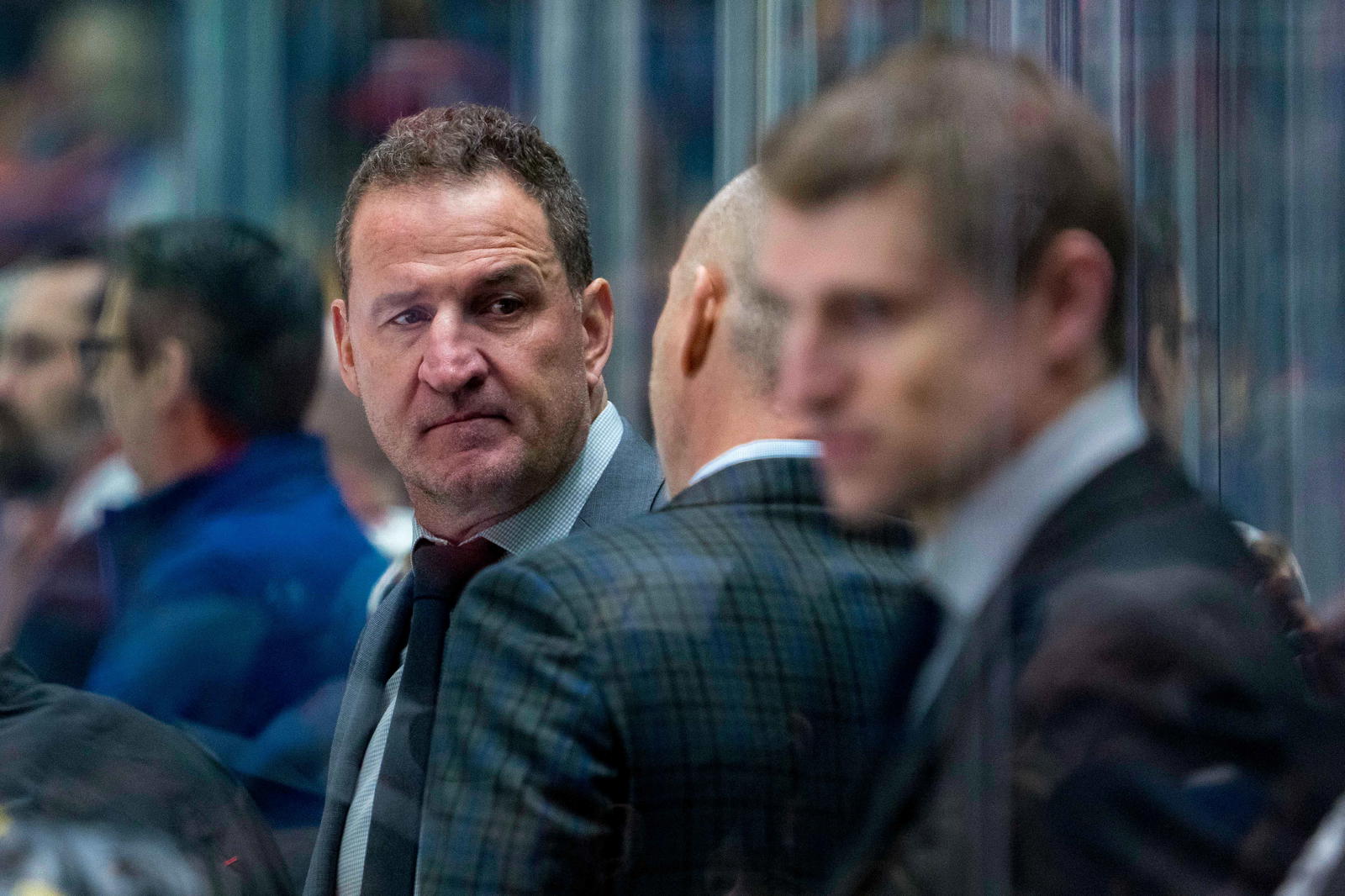 Jan 18, 2025; Vancouver, British Columbia, CAN; Vancouver Canucks assistant coach Adam Foote on the bench against the Edmonton Oilers in the second period at Rogers Arena. Mandatory Credit: Bob Frid-Imagn Images