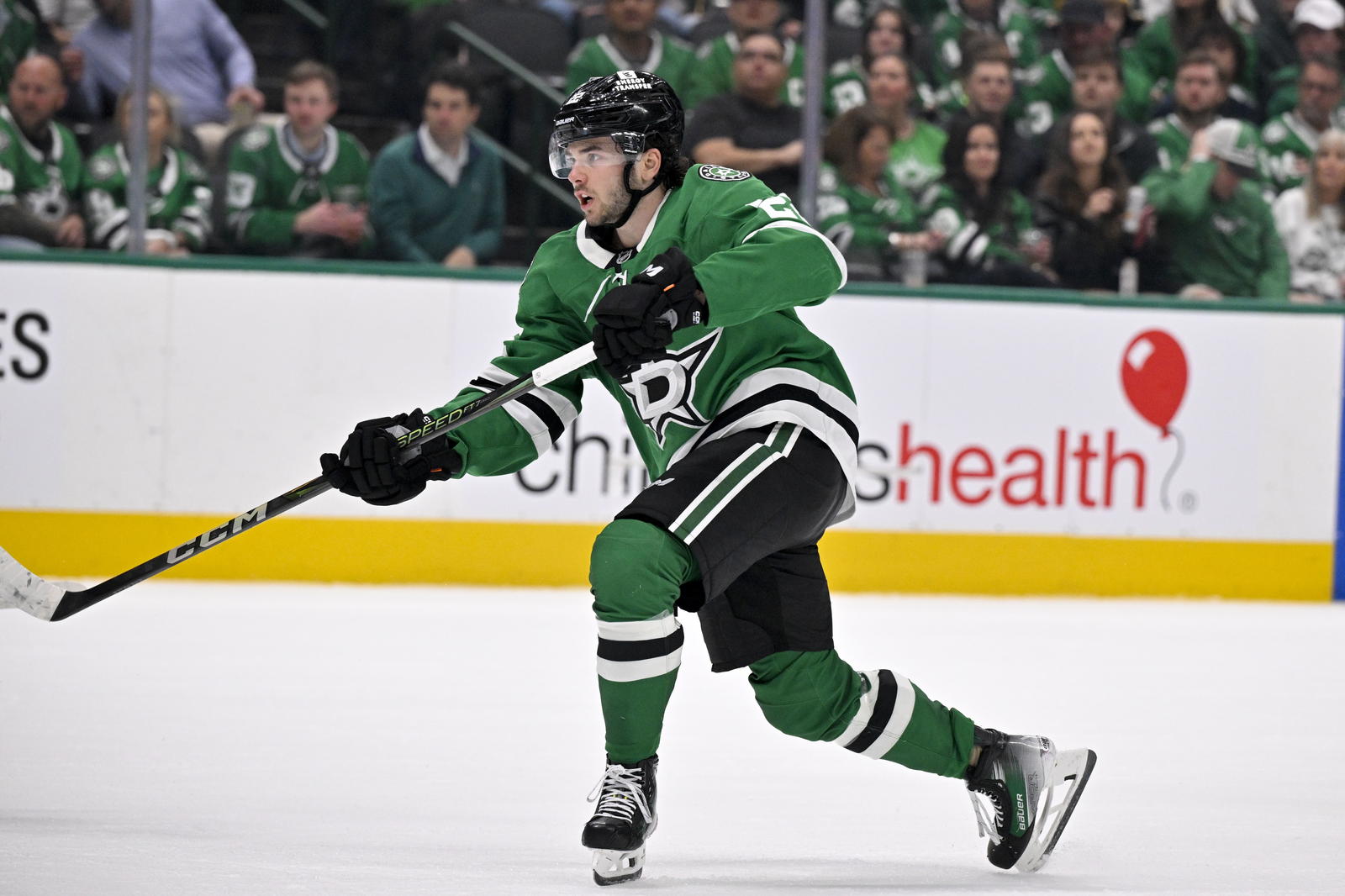 Apr 10, 2025; Dallas, Texas, USA; Dallas Stars center Mavrik Bourque (22) shoots the puck in the Winnipeg Jets zone during the second period at the American Airlines Center. (Jerome Miron-Imagn Images)
