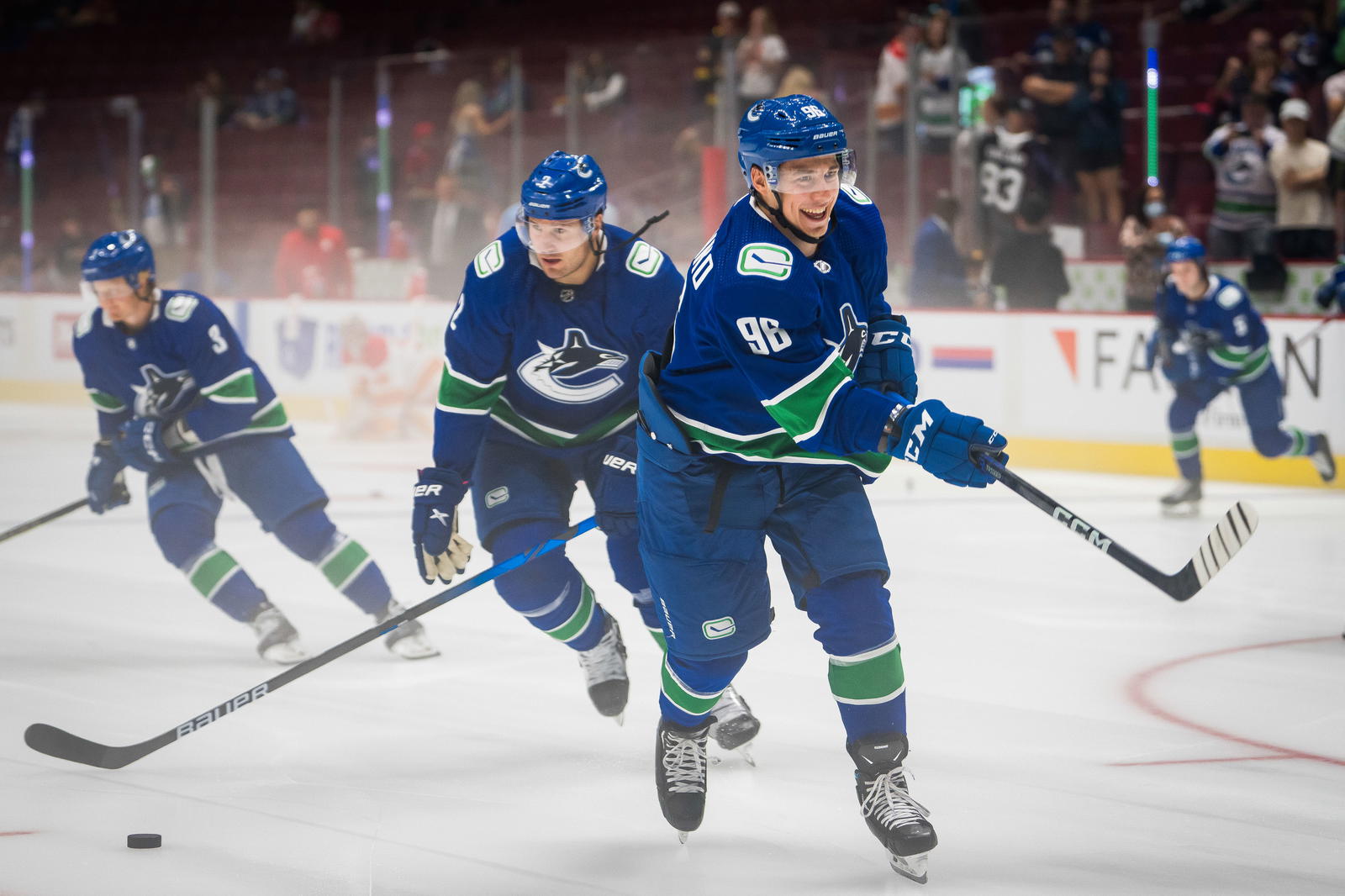 Sep 25, 2022; Vancouver, British Columbia, CAN; Vancouver Canucks forward Andrei Kuzmenko (96) warms up in the fog prior to a game against the Calgary Flames at Rogers Arena. Calgary won 3-2 in overtime. Mandatory Credit: Bob Frid-Imagn Images