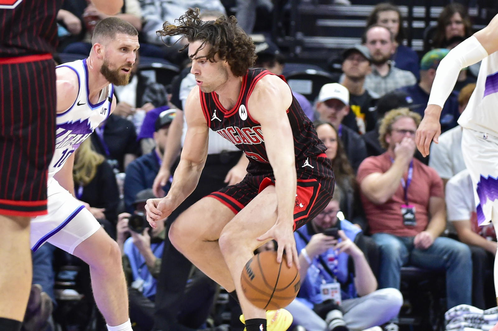 Nov 16, 2025; Salt Lake City, Utah, USA; Utah Jazz guard/forward Svi Mykhailiuk (10) looks to defend Chicago Bulls guard Josh Giddey (3) during the first half at Delta Center. Mandatory Credit: Peter Creveling-Imagn Images