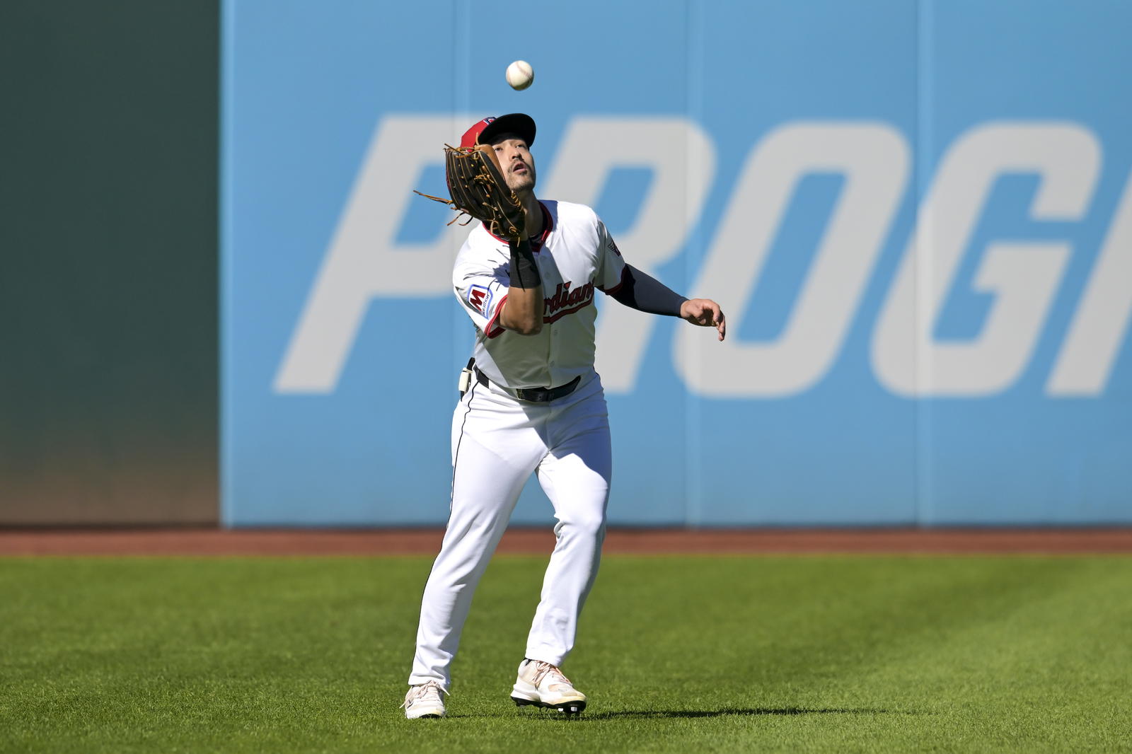 Oct 1, 2025; Cleveland, Ohio, USA; Cleveland Guardians outfielder Steven Kwan (38) makes a catch on a hit by Detroit Tigers outfielder Parker Meadows (22) in the fifth inning during game two of the Wildcard round for the 2025 MLB playoffs at Progressive Field. Mandatory Credit: Ken Blaze-Imagn Images