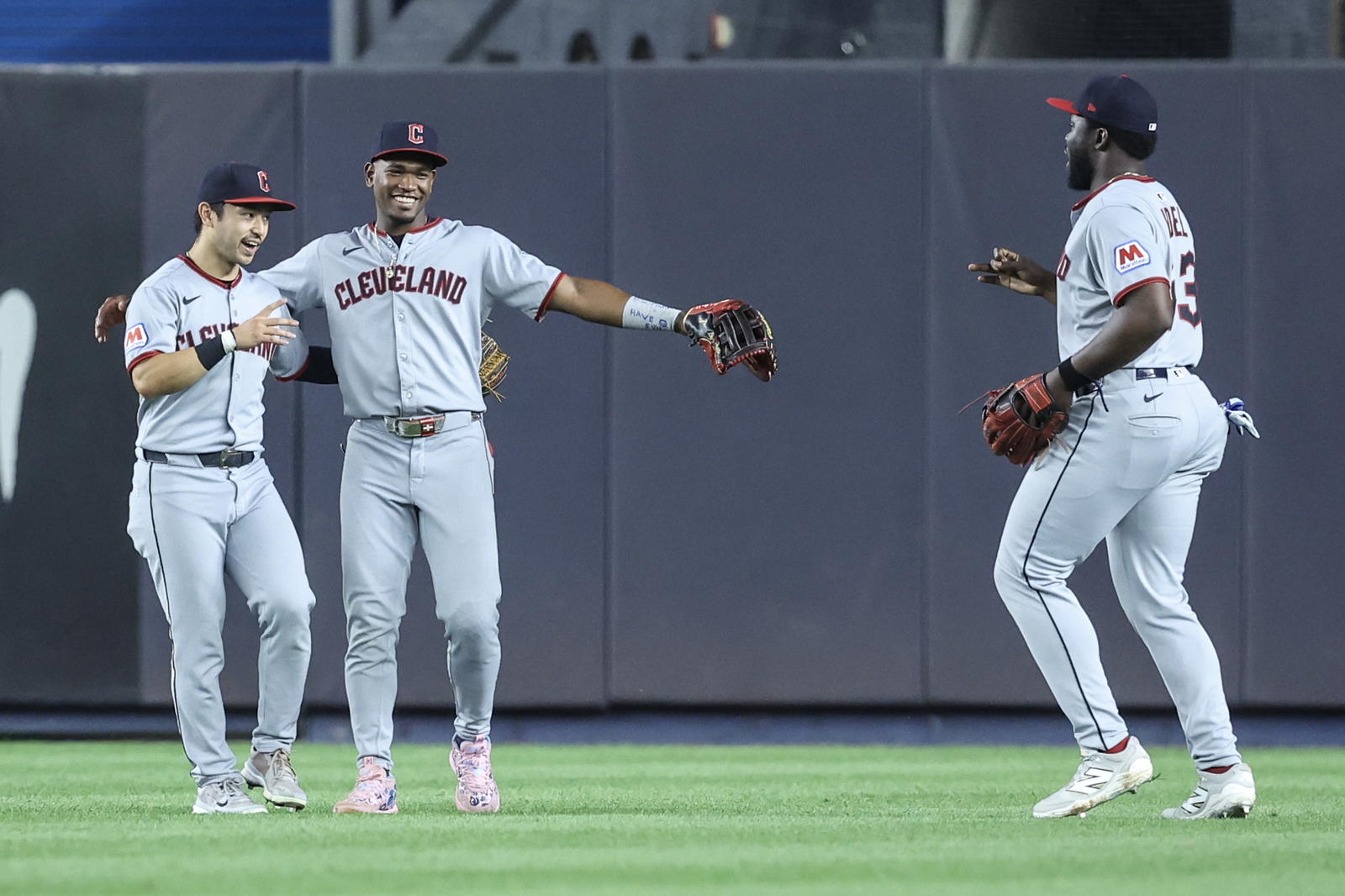 Jun 4, 2025; Bronx, New York, USA; Cleveland Guardians outfielders Steven Kwan (38), Angel Martinez (1) and Jhonkensy Noel (43) celebrate after defeating the New York Yankees 4-0 at Yankee Stadium. Mandatory Credit: Wendell Cruz-Imagn Images